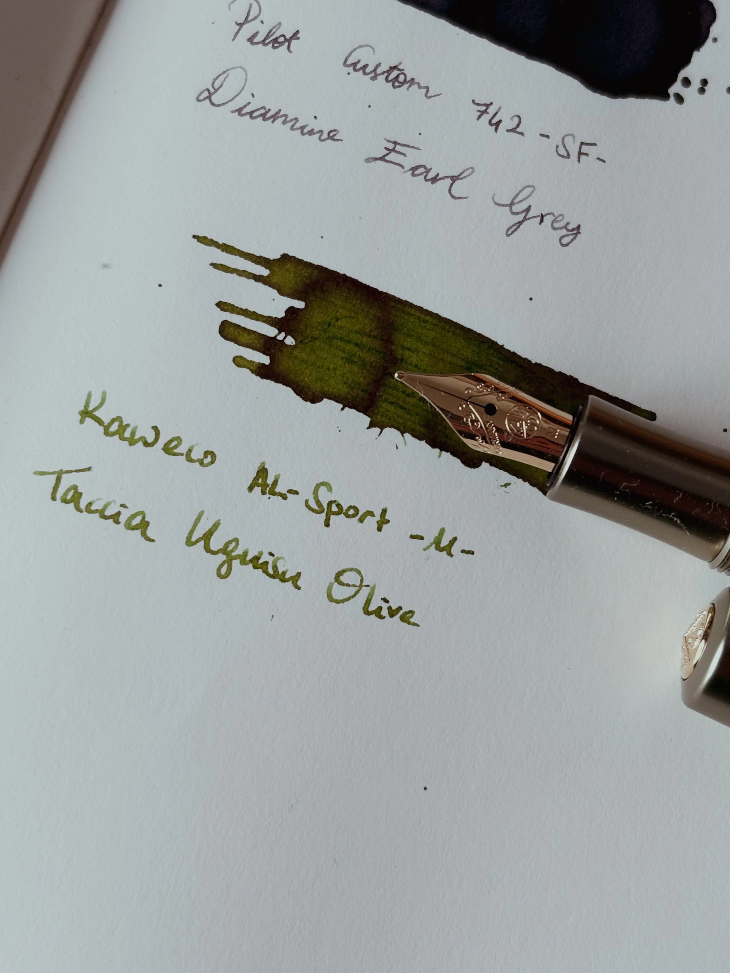 Kaweco AL-Sport Olivine fountain pen inked with Taccia Uguisu Olive fountain pen ink.