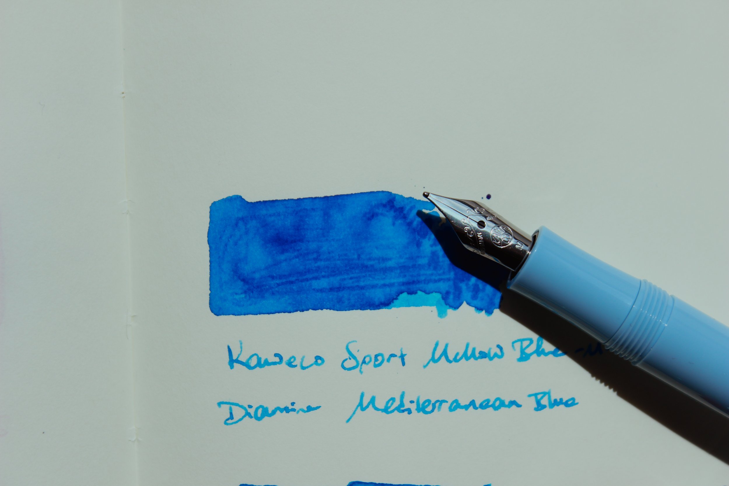 Kaweco Sport Mellow Blue fountain pen filled with Diamine Mediterranean Blue fountain pen ink.