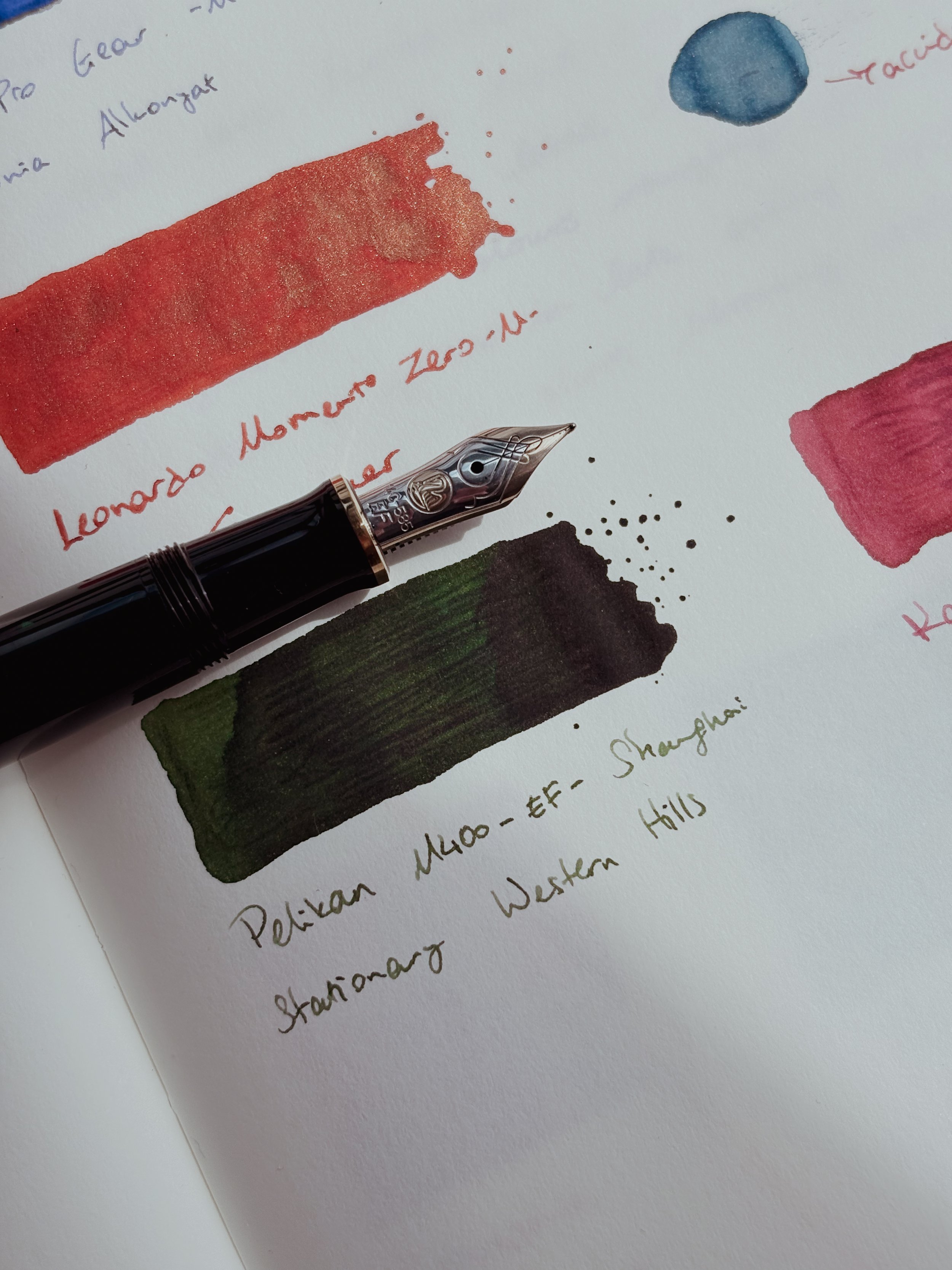 Pelikan M400 fountain pen inked with Shanghai Stationary Western Hills fountain pen ink.