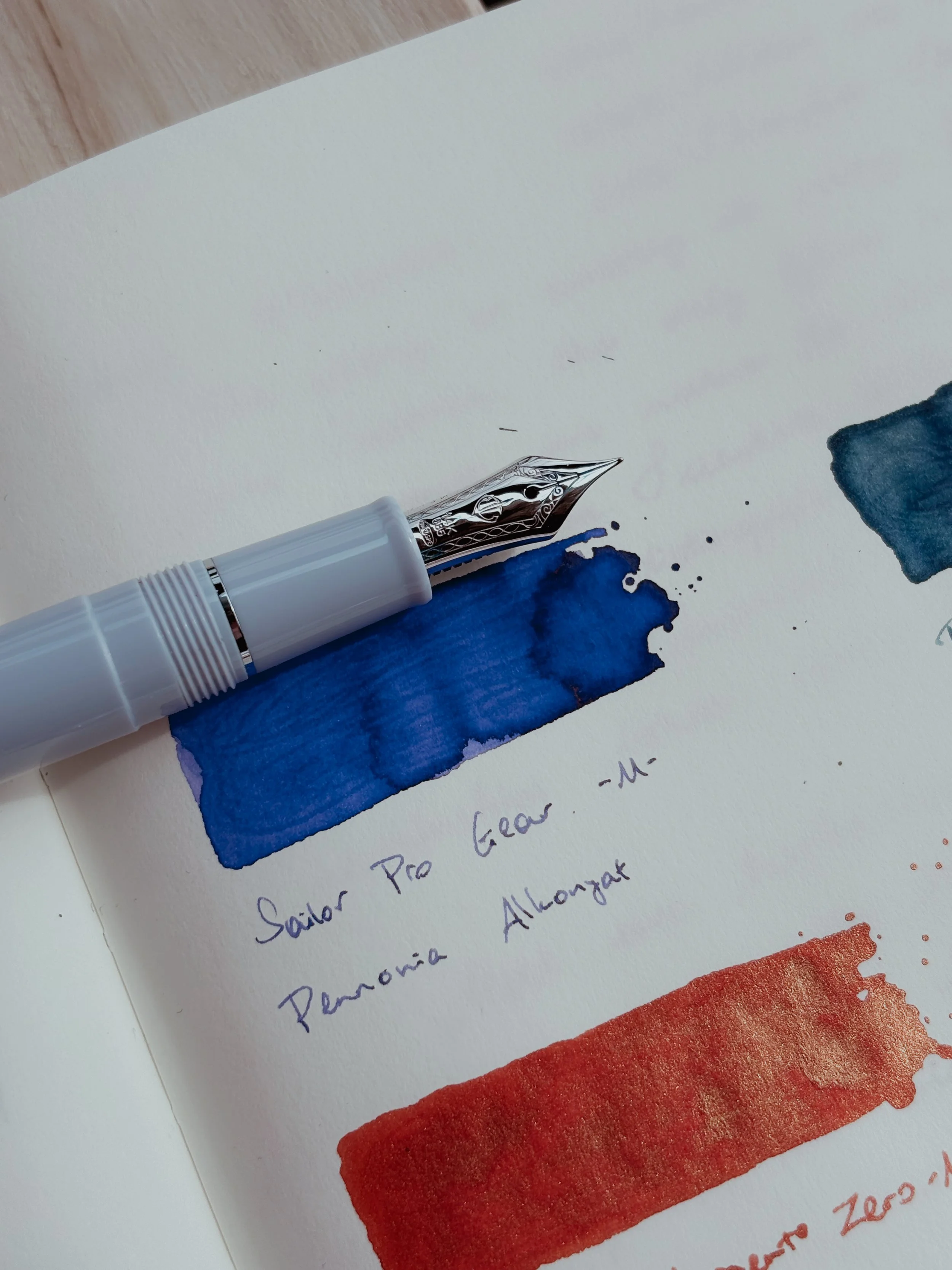 Sailor Pro Gear Wisteria fountain pen inked with Pennonia Alkonyat fountain pen ink.