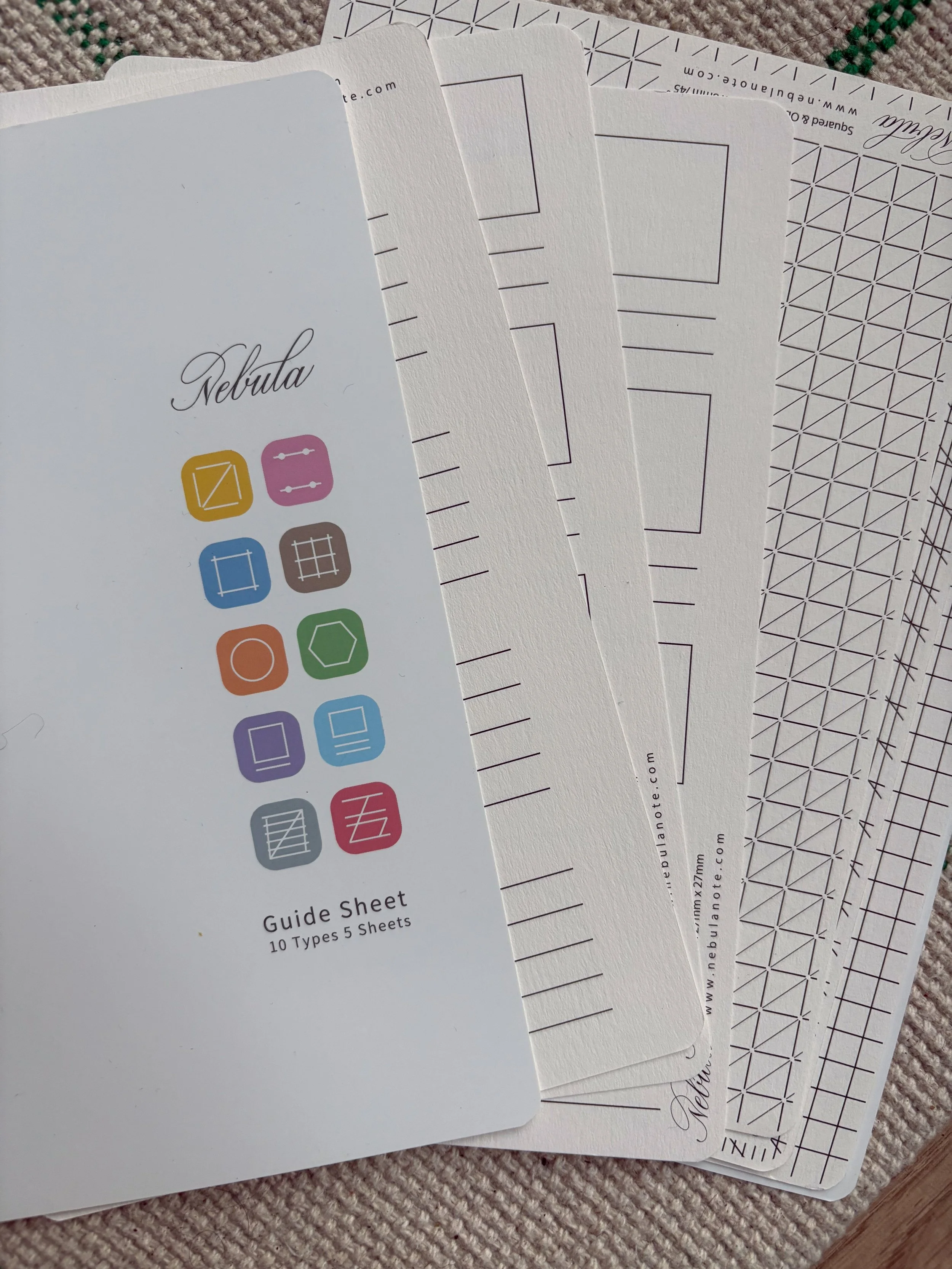 Colorverse Nebula Guide Sheets for writing displayed to show variety of the guides included in the pack.