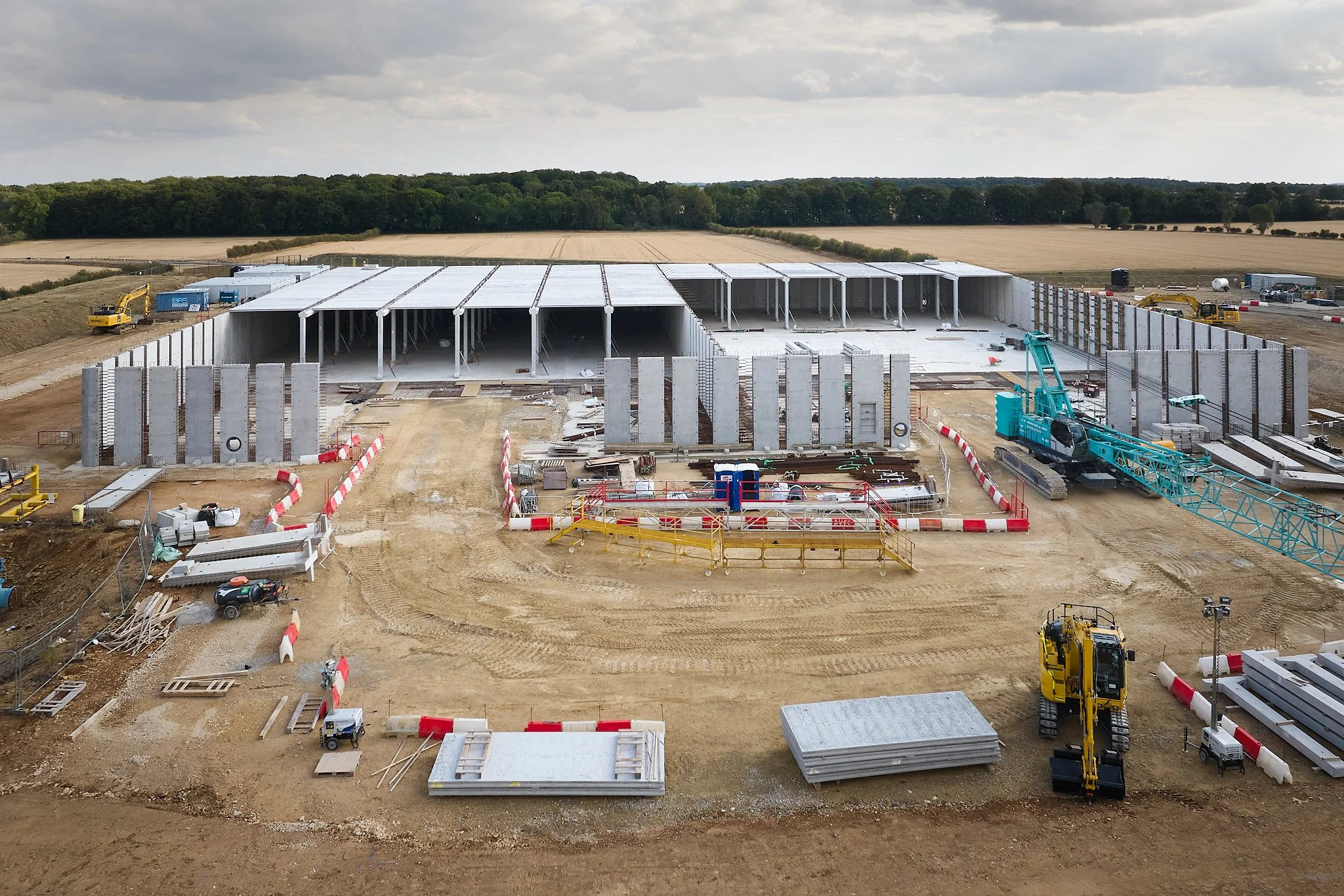 Aerial drone shot of above ground reservoir under construction.