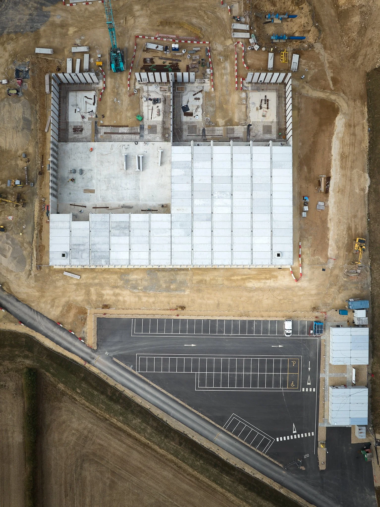 Overhead drone shot of above ground reservoir under construction.