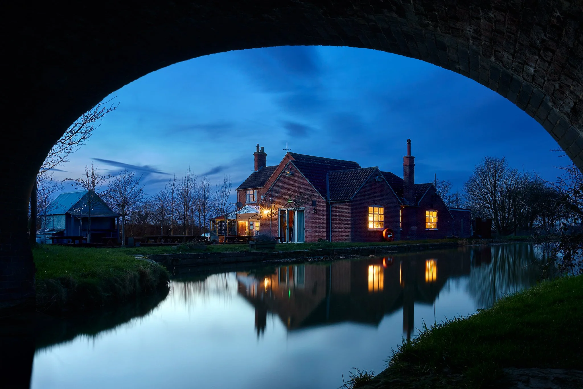 Blue hour reflection of The Duck at Woolsthorpe public house near Grantham in the Vale of Belvoir