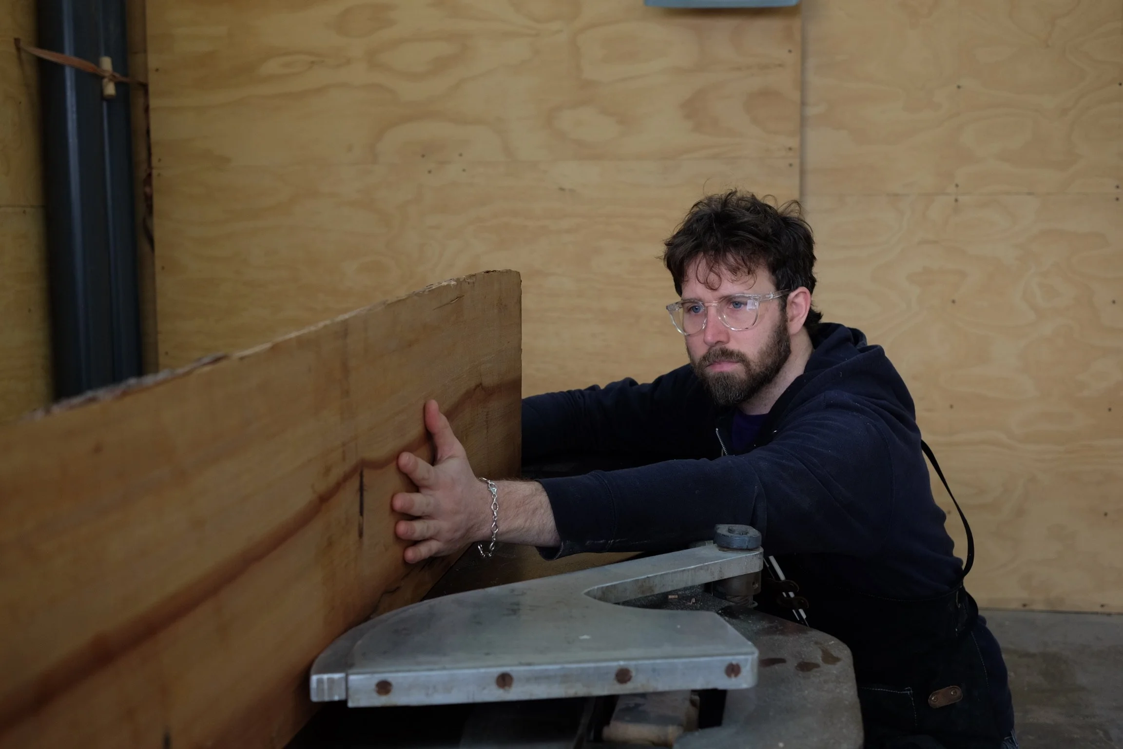 Furniture maker and designer David Flatow working in the workshop of making new custom furniture
