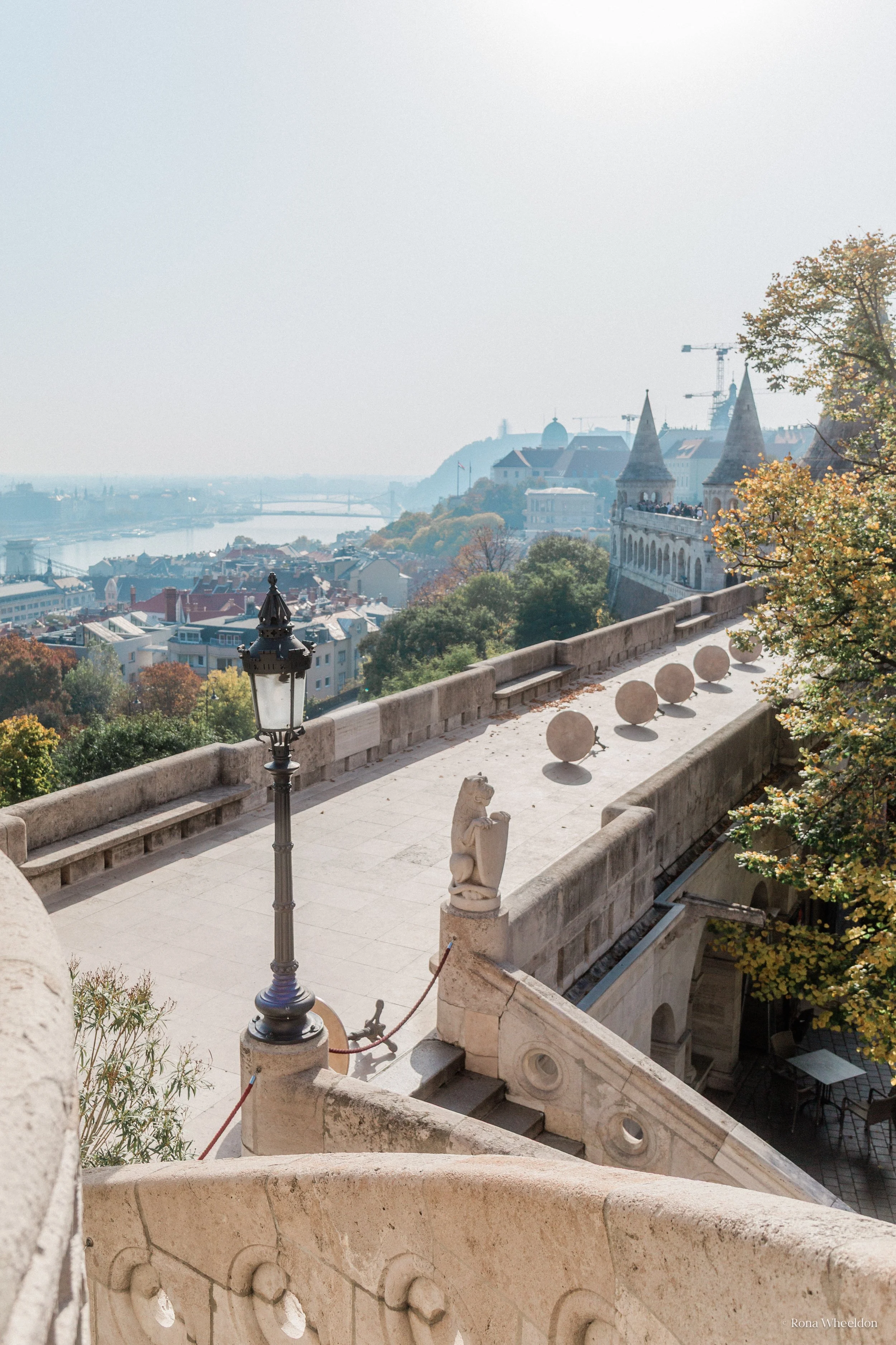 Stone terrace with views of the Danube and its bridges