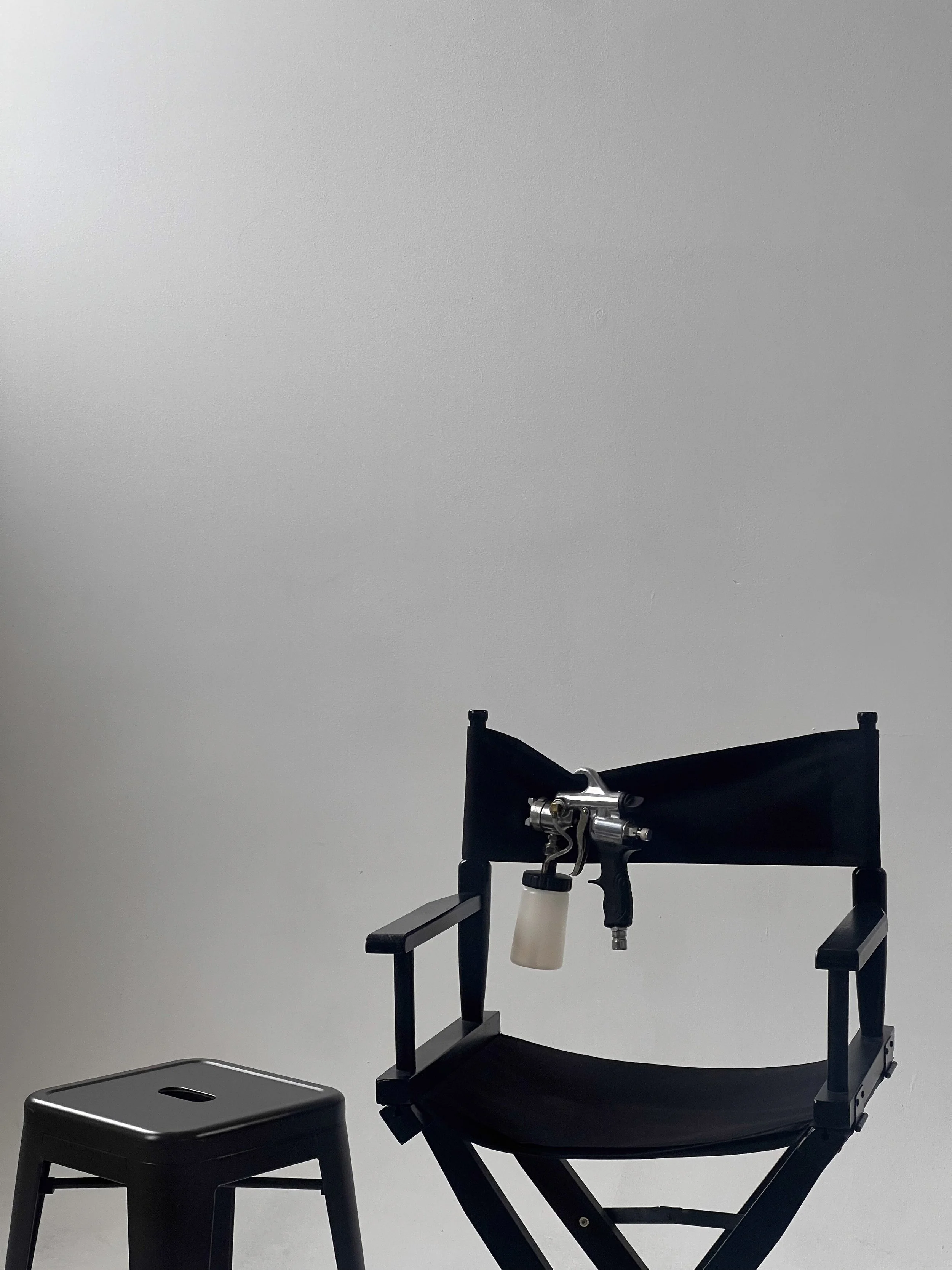 Professional spray tan gun at Renūude Skin studio in Meridian, Idaho