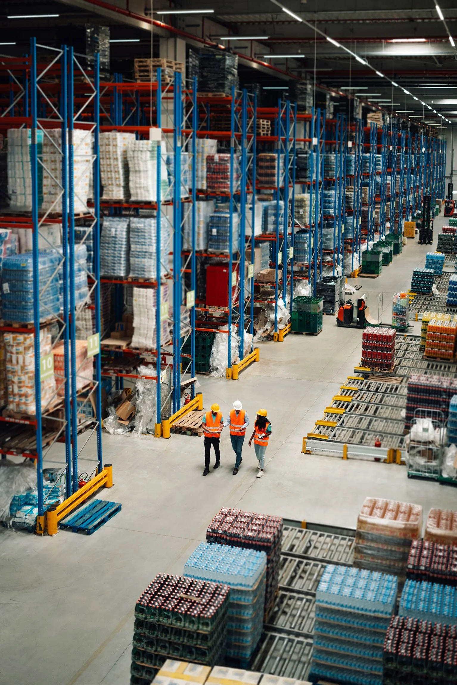 warehouse-workers-walking-through-inventory.jpg