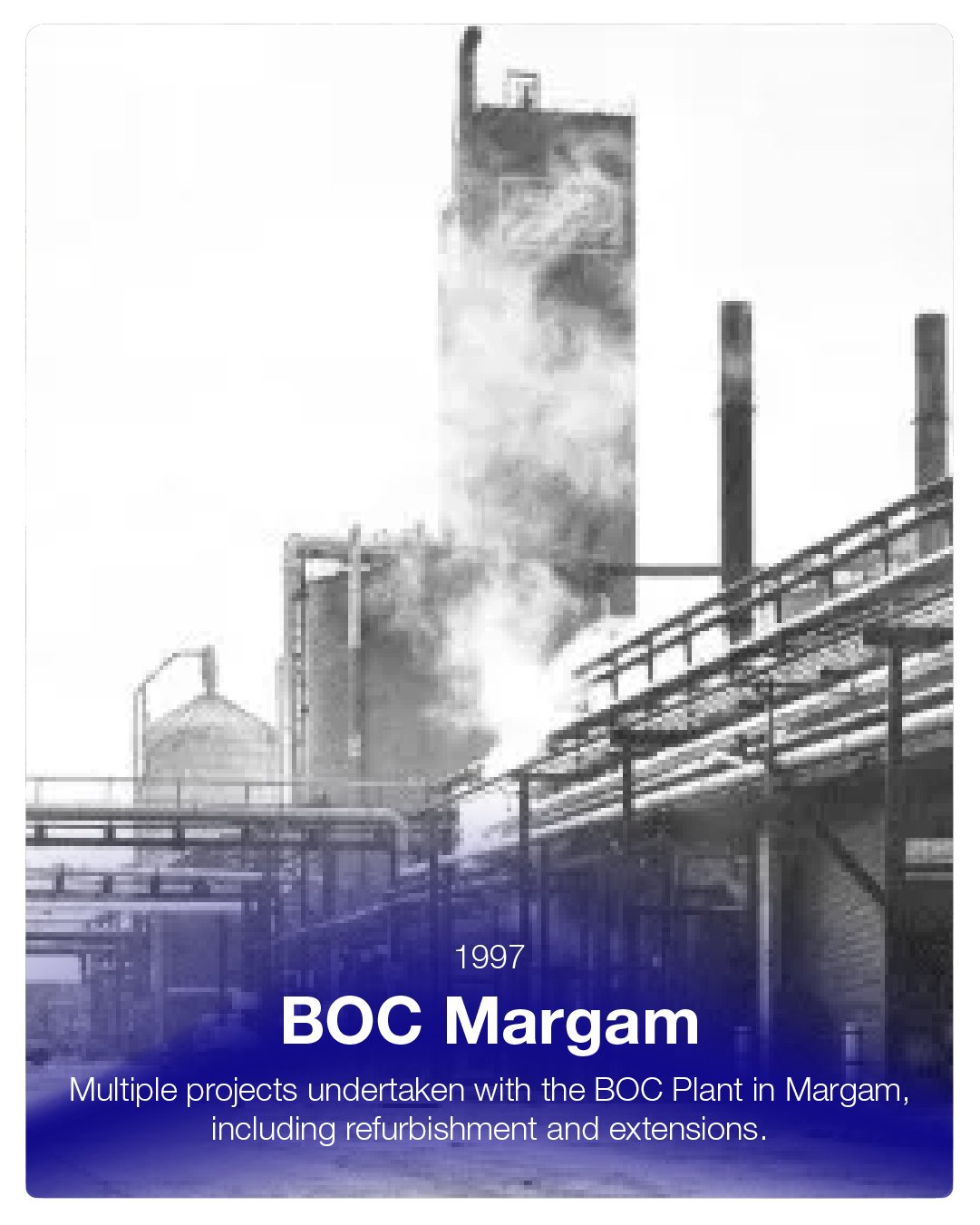 Black and white photo of an industrial facility with smoke or steam rising from large chimneys and buildings, labeled '1997 BOC Margam'.