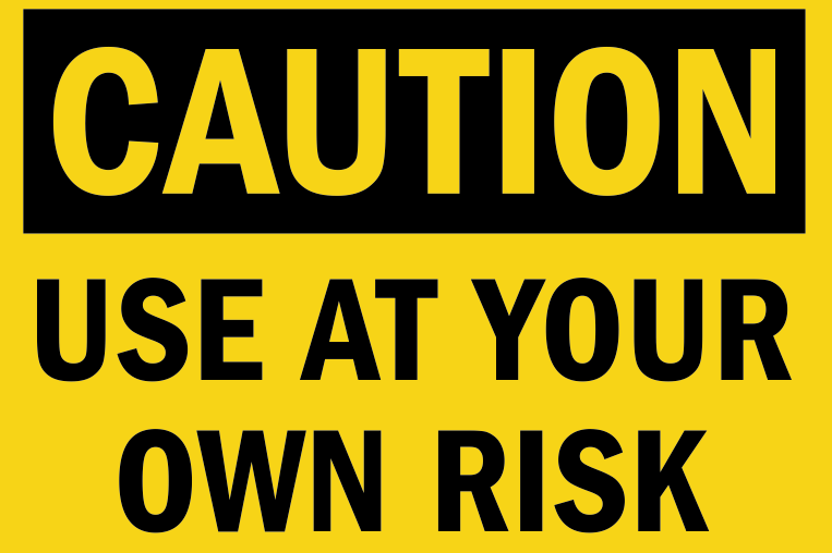Yellow safety sign with black text that reads, "Caution Use at Your Own Risk."
