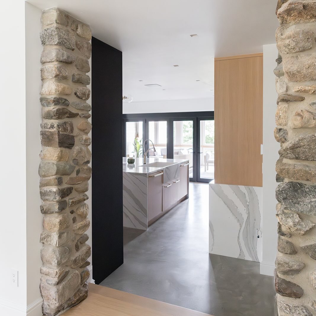 Same vantage point. Completely reimagined.

What was once a formal dining room that ended at a slate patio is now the true heart of the home. This space was thoughtfully transformed into a fully functional kitchen that flows seamlessly into a new sun