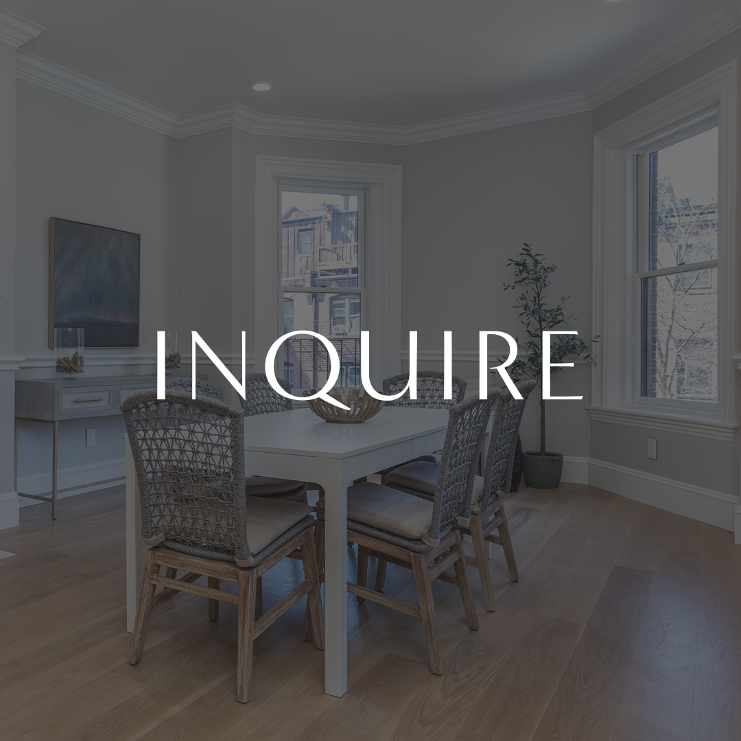 Modern dining room with a white table, wicker chairs, and large windows. Text "INQUIRE" overlays the image.