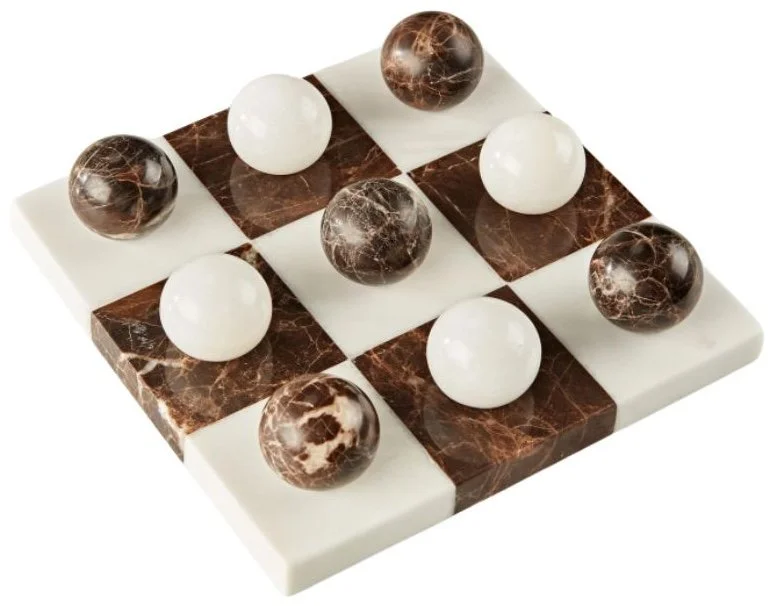 Marble Tic Tac Toe Board.

A timeless decorative accent that doubles as a functional game, bringing elegance and personality to coffee tables and bookshelves. Crafted from natural marble, it's the perfect piece for creating a beautifully layered, des