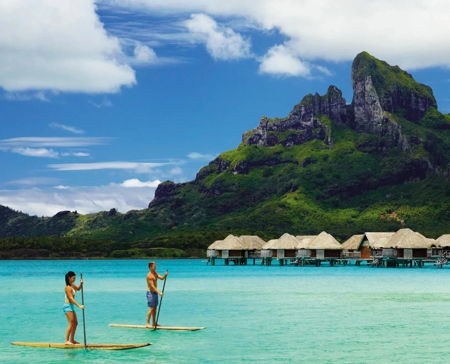 Four-Seasons-Resort-Bora-Bora-Couple-Paddleboarding-2000x1200_29556.jpg