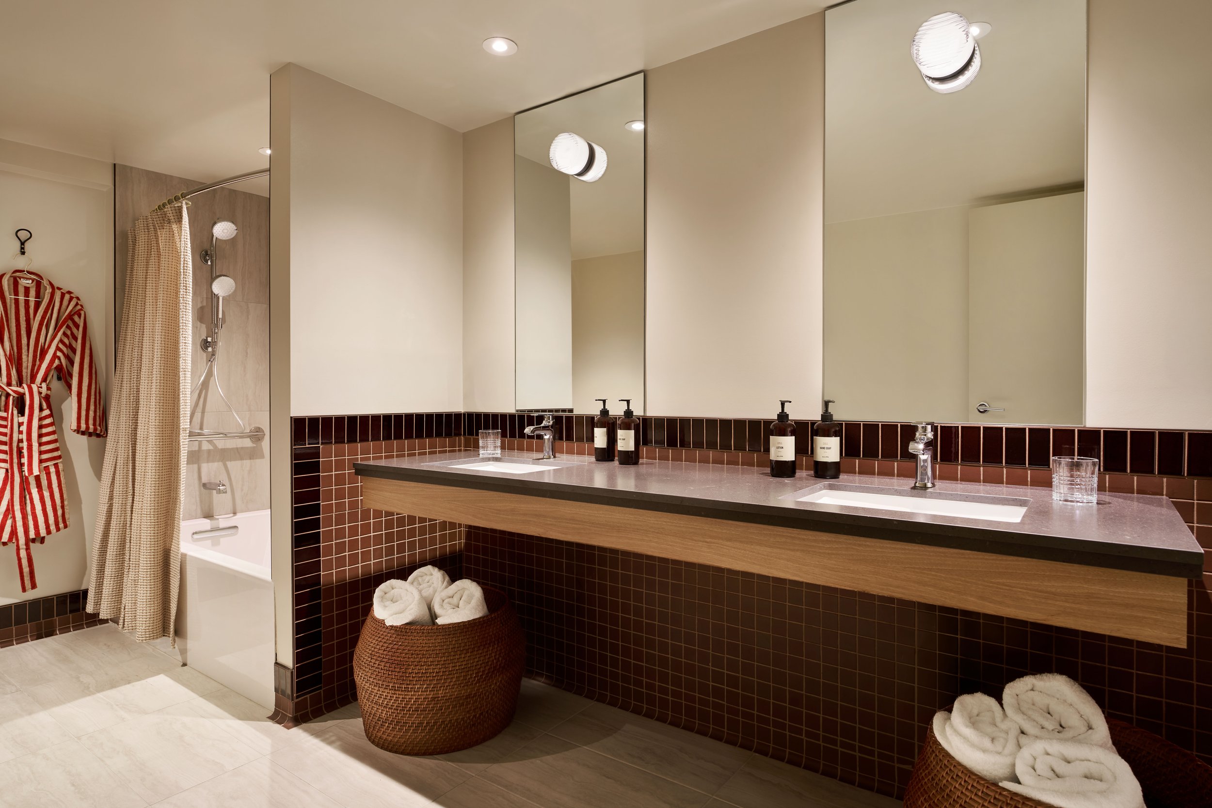 001_260323_WerkCreative_All Inn Hotel_DoubleQueenSuiteBath_72DPI.jpg