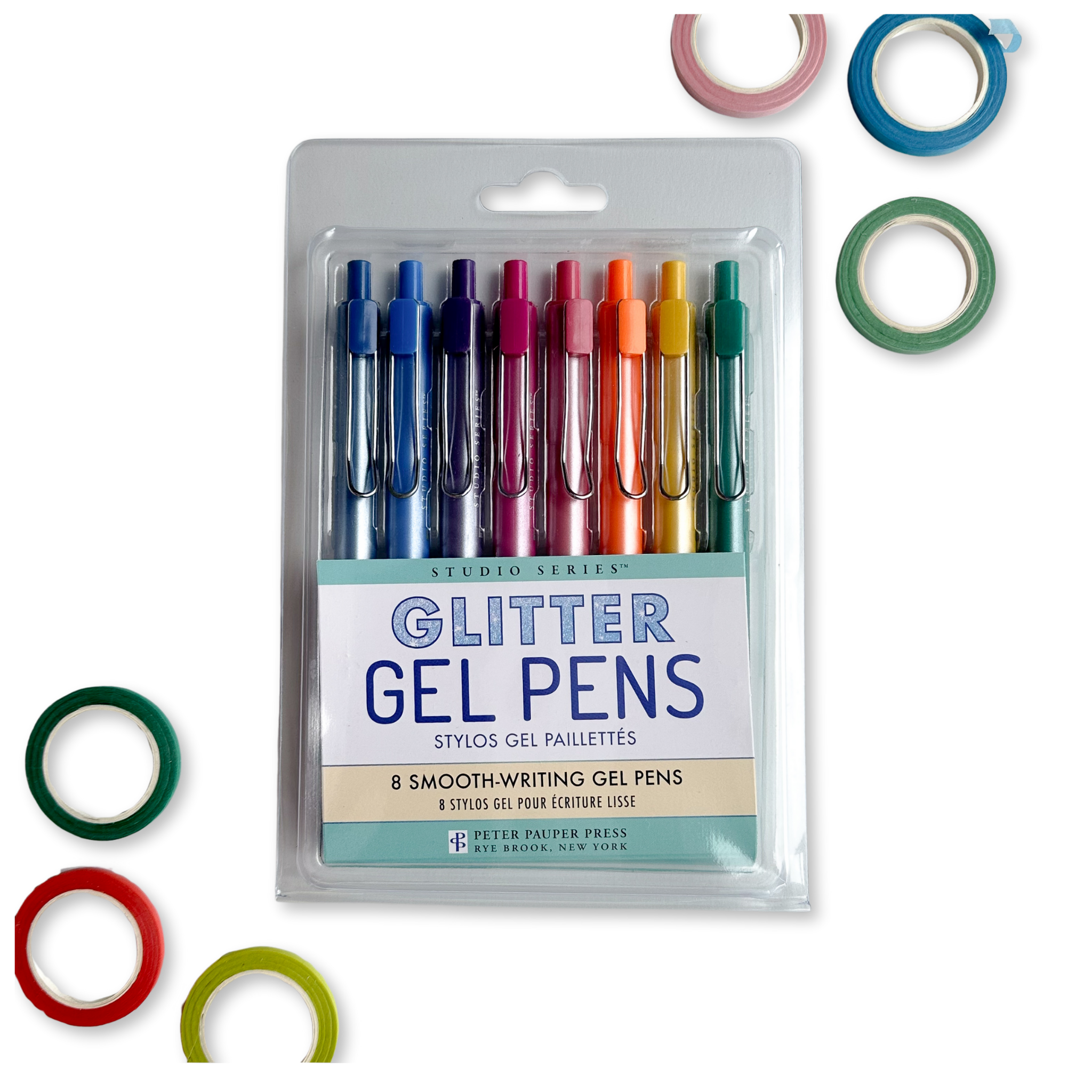 colorful glitter gel pens with washi tape scattered around