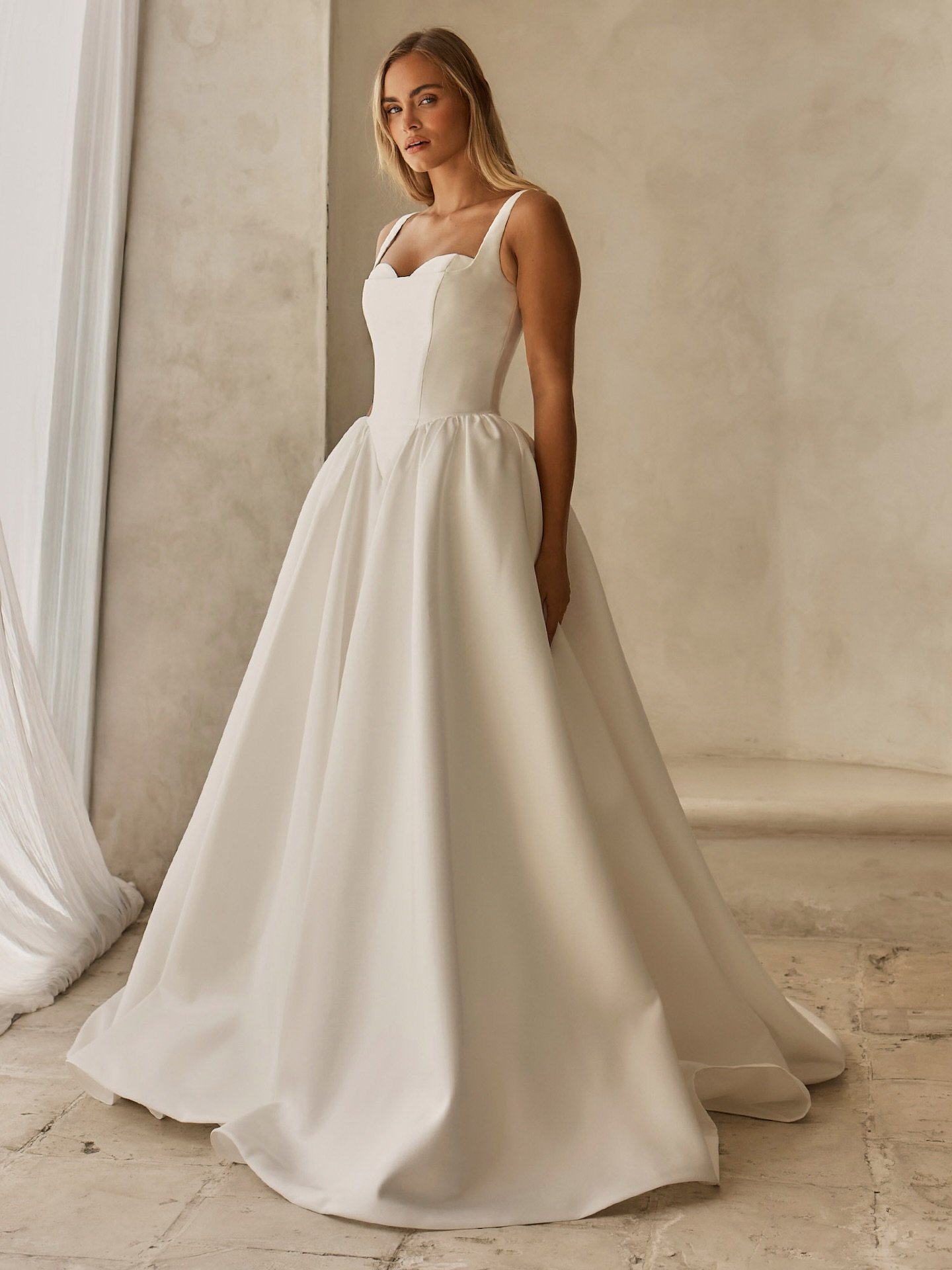 TEDDY &hearts;️

Timeless drama meets modern minimalism ✨ one of our newest arrivals from @serenebymadilane Teddy is available to try on now! 

With classic lines and a contemporary twist this dress is for the bride who thinks less is more but still 