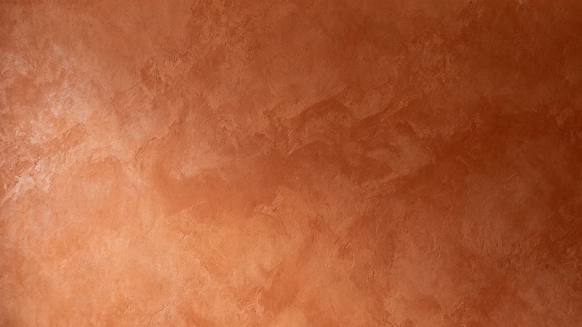 Close-up of a person's skin with a light brown complexion, showing a subtle texture and natural variations in tone.