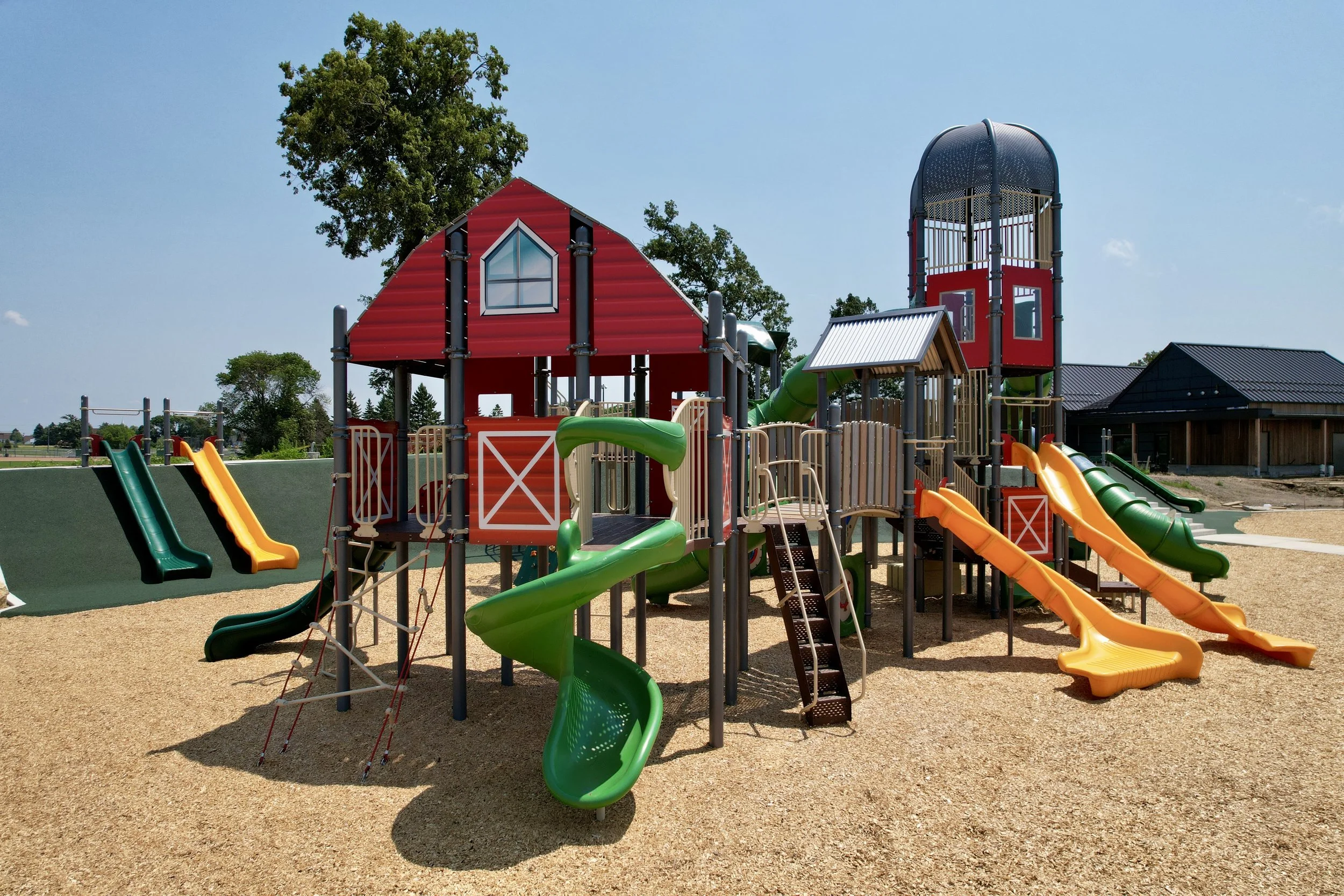 Heritage Park community playground under construction in Corcoran, Minnesota.JPG