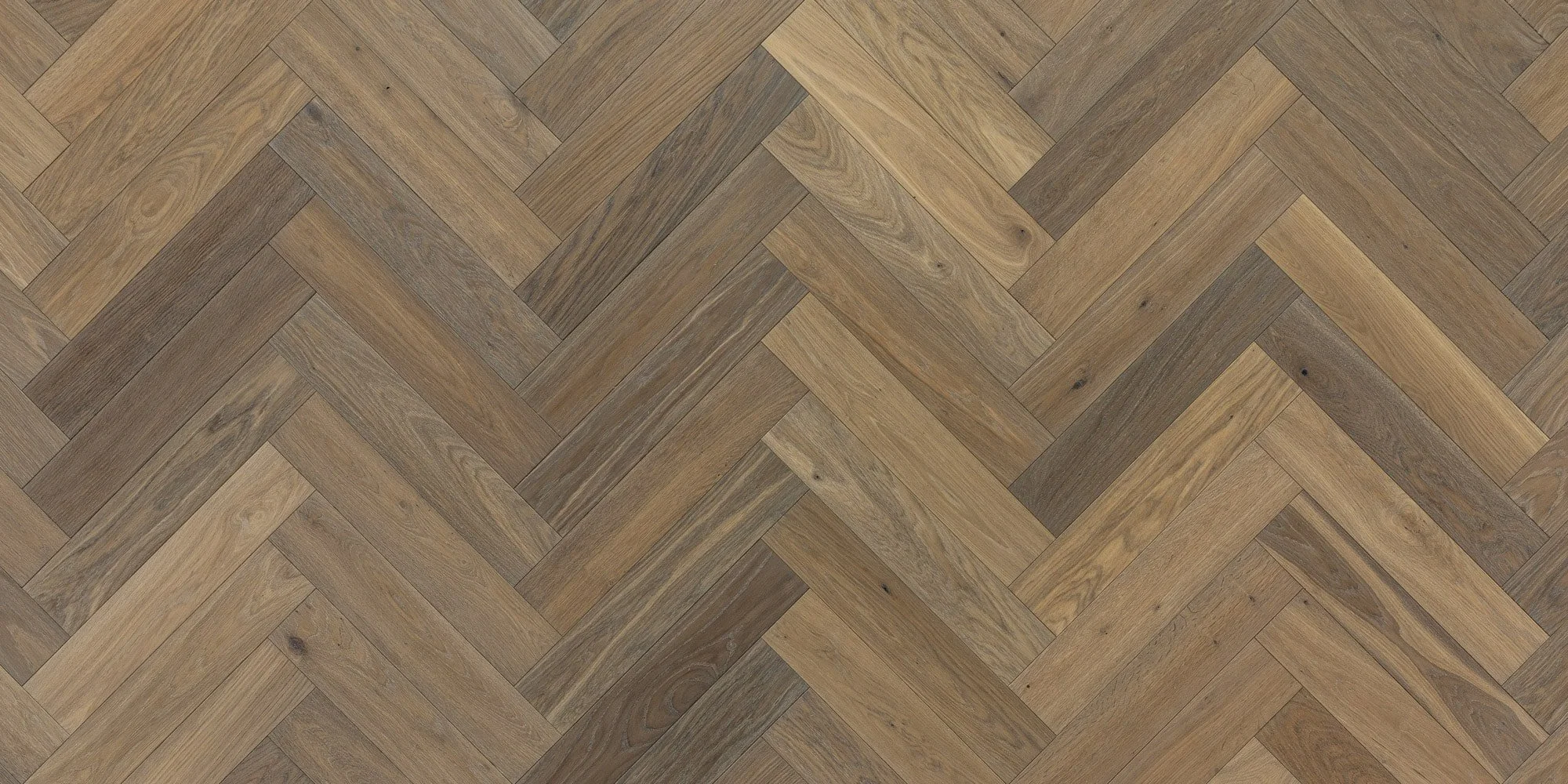 Houten vloer in een visgraatpatroon.