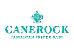 Logo de Cañerock, garniture épicée américaine, avec un dessin d'une tortue au sommet du texte.