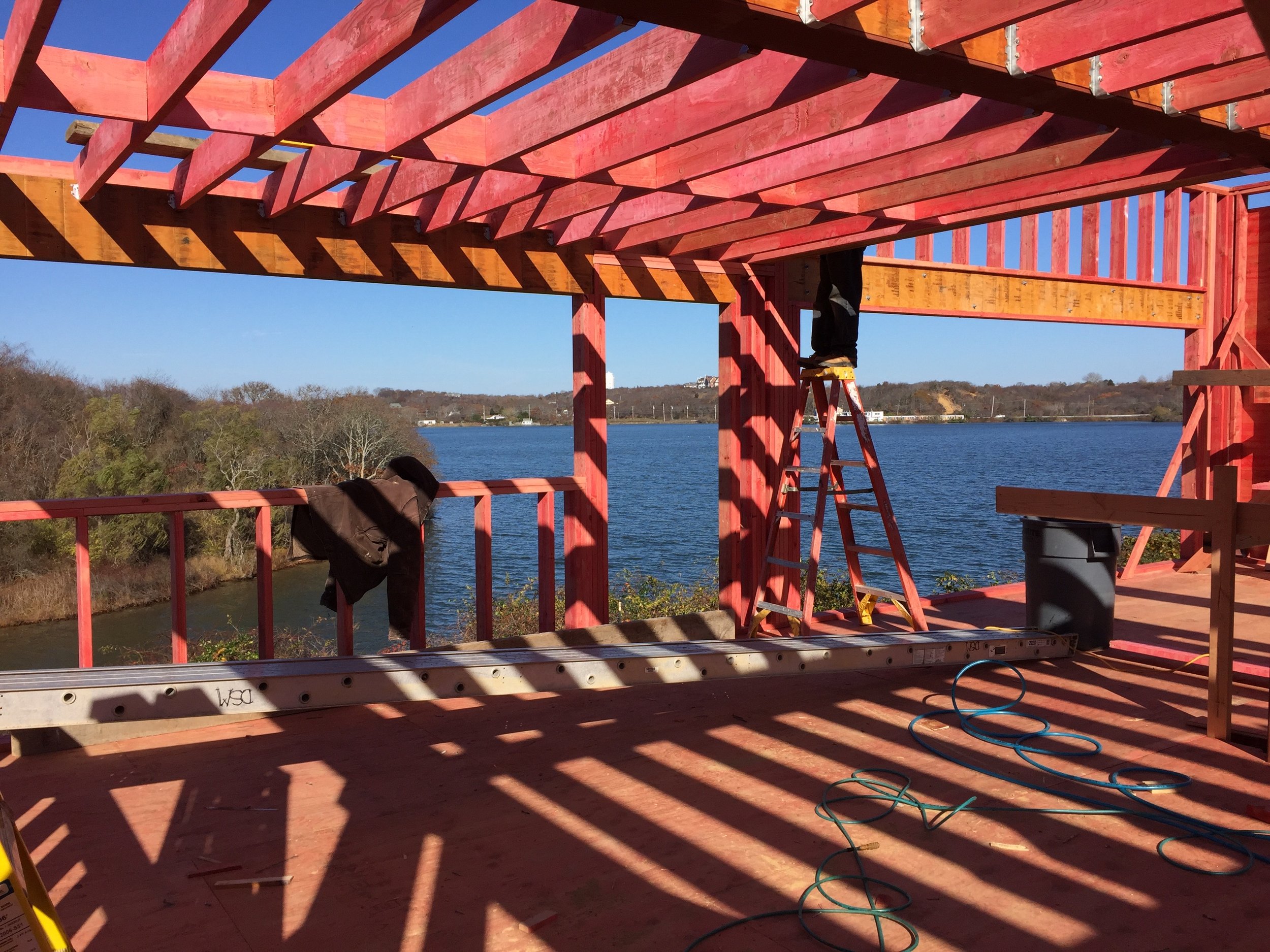 In progress: The use of red fire retardent wood (RFTW) ( dye color from iron oxide) kitchen and deck