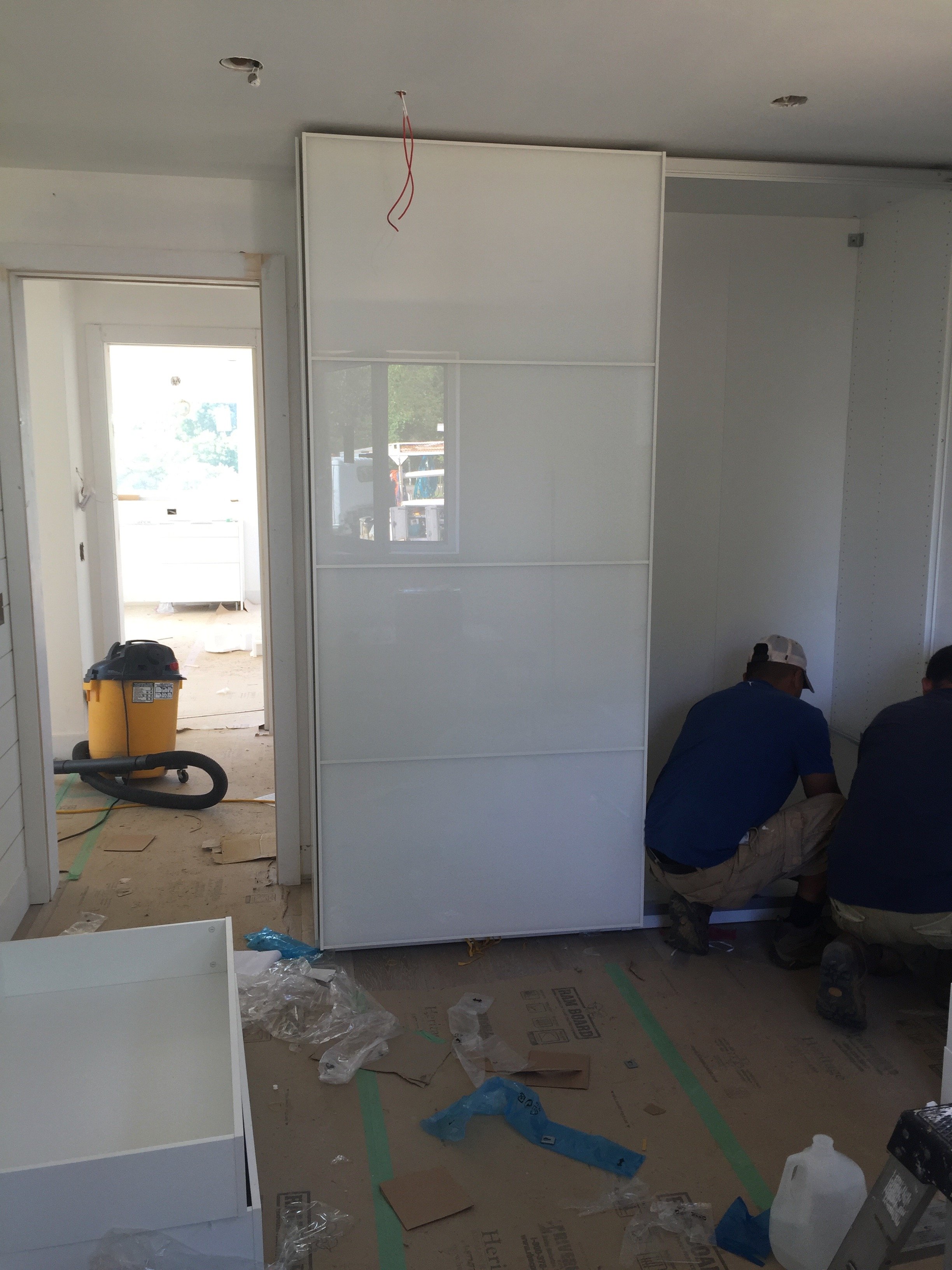 Installing closets.jpg