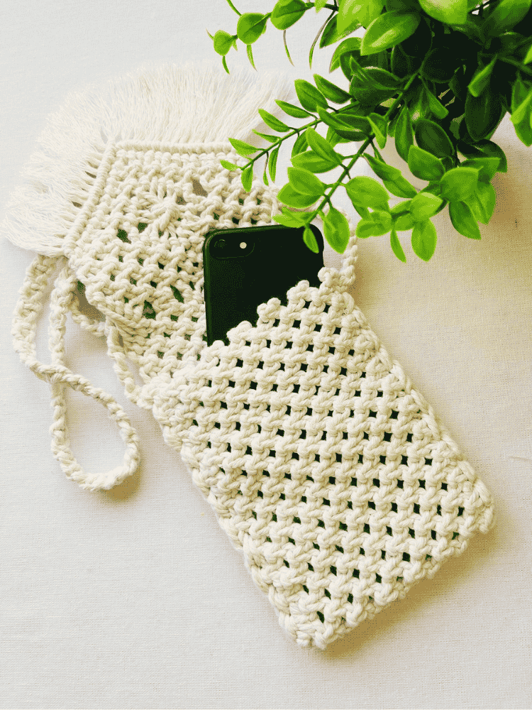 Macramé phone bag with phone inside – handmade off-white cotton pouch with boho fringe
