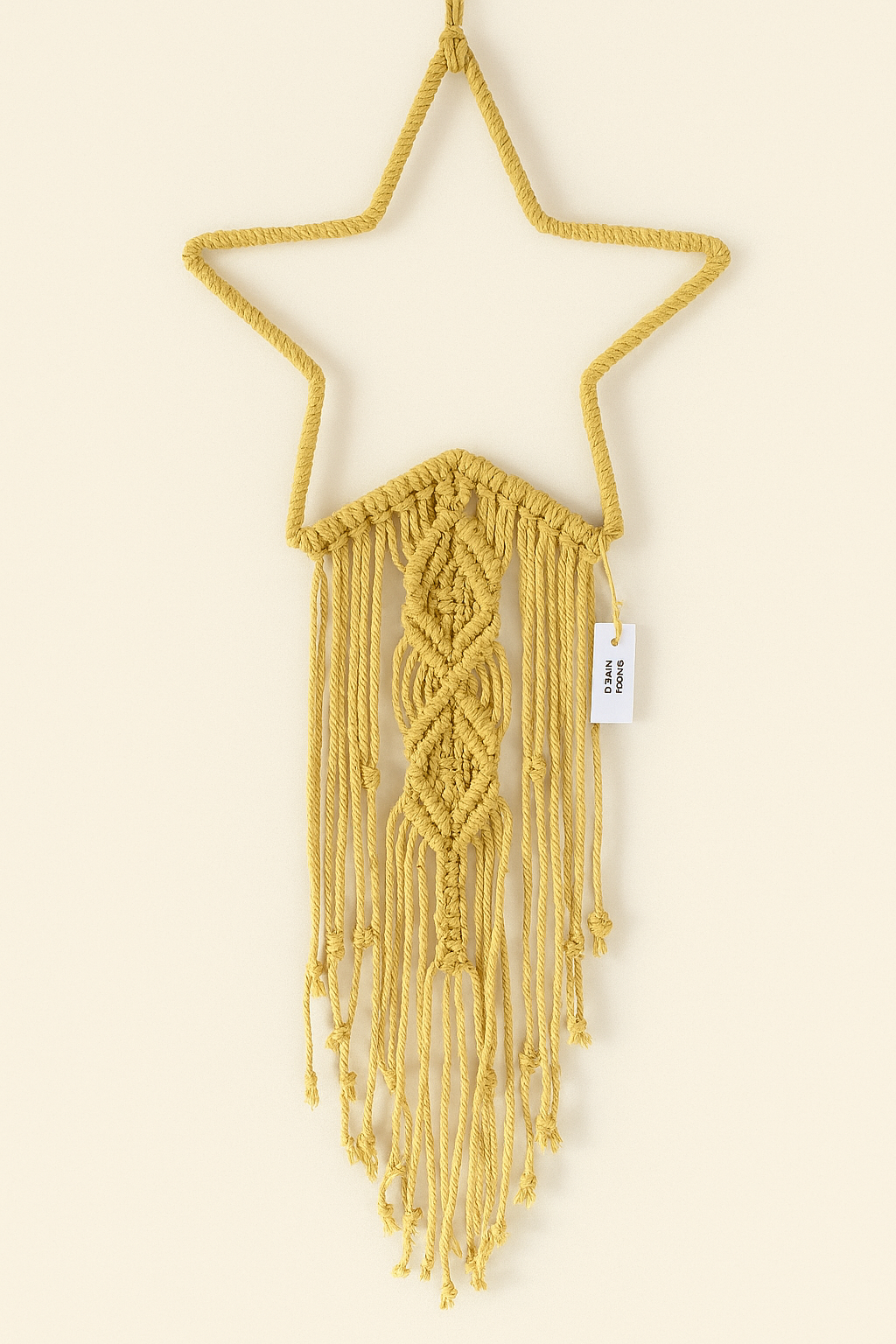 Handmade mustard yellow macramé star wall hanging with fringe and decorative knots – cozy boho decor by Samra Knots.
