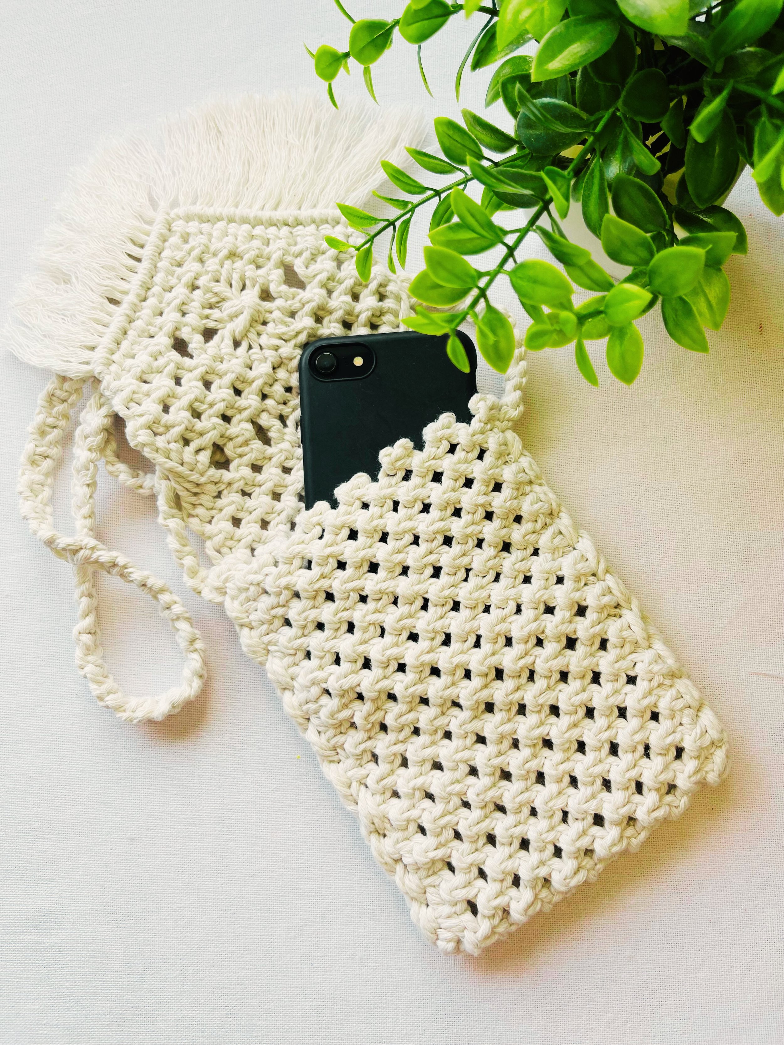 Macramé phone bag with phone inside – handmade off-white cotton pouch with boho fringe