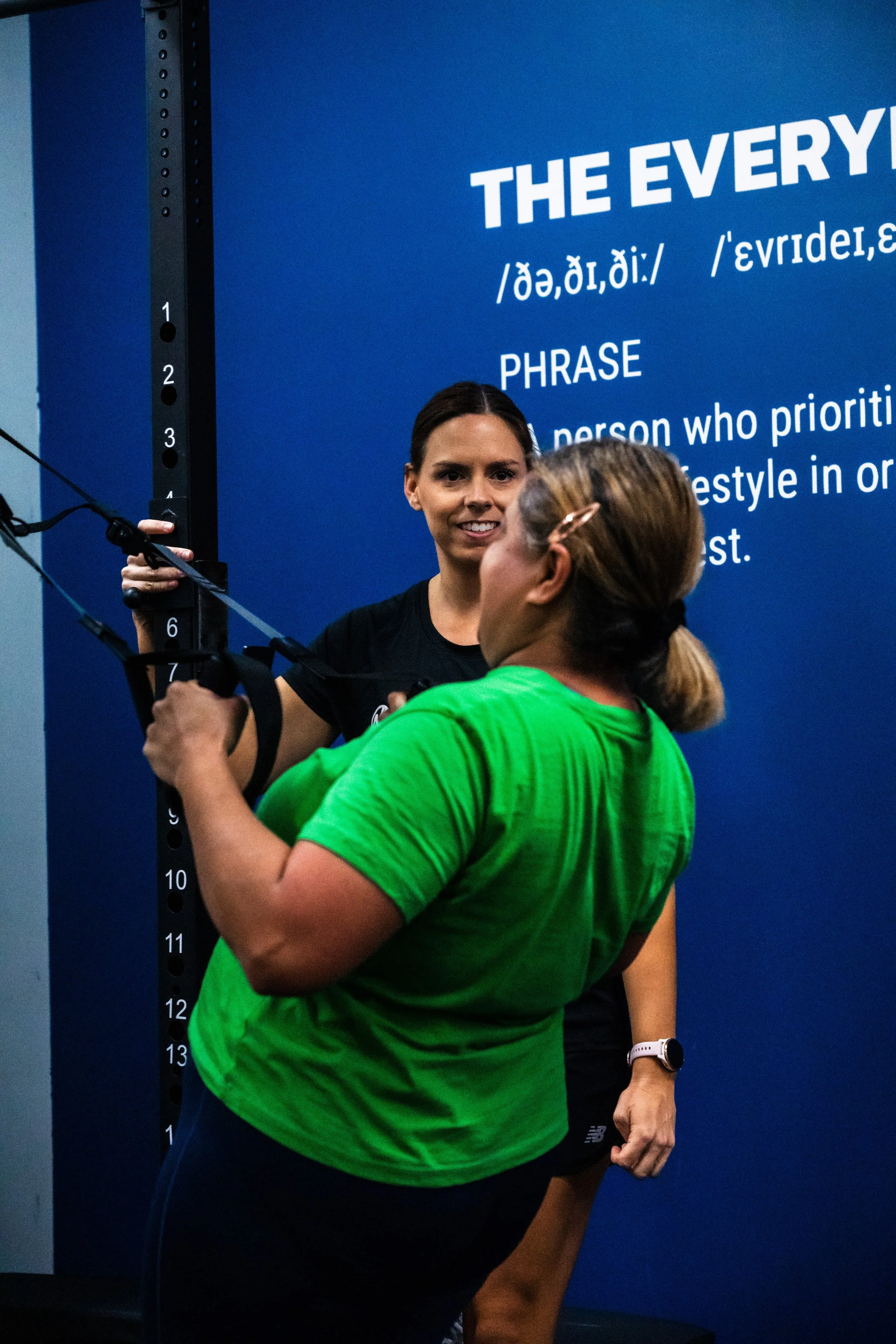 Physiotherapist guiding elbow pain rehabilitation exercises in Varsity Lakes clinic