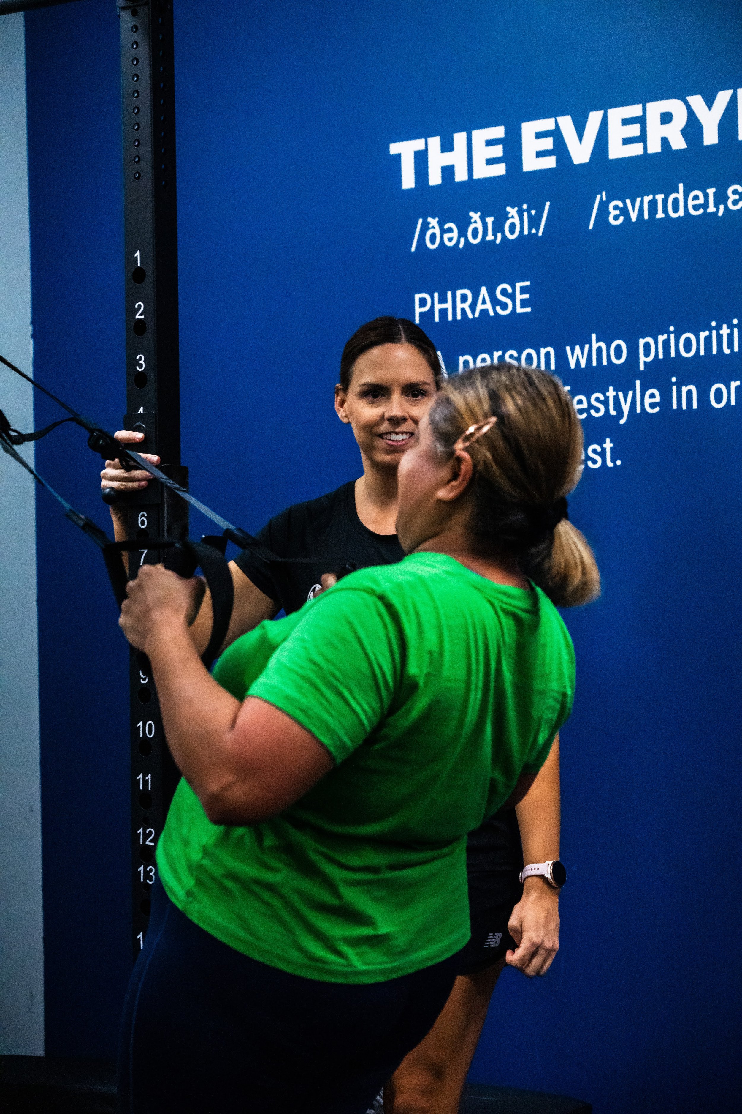 Physiotherapist guiding elbow pain rehabilitation assessment in Varsity Lakes clinic