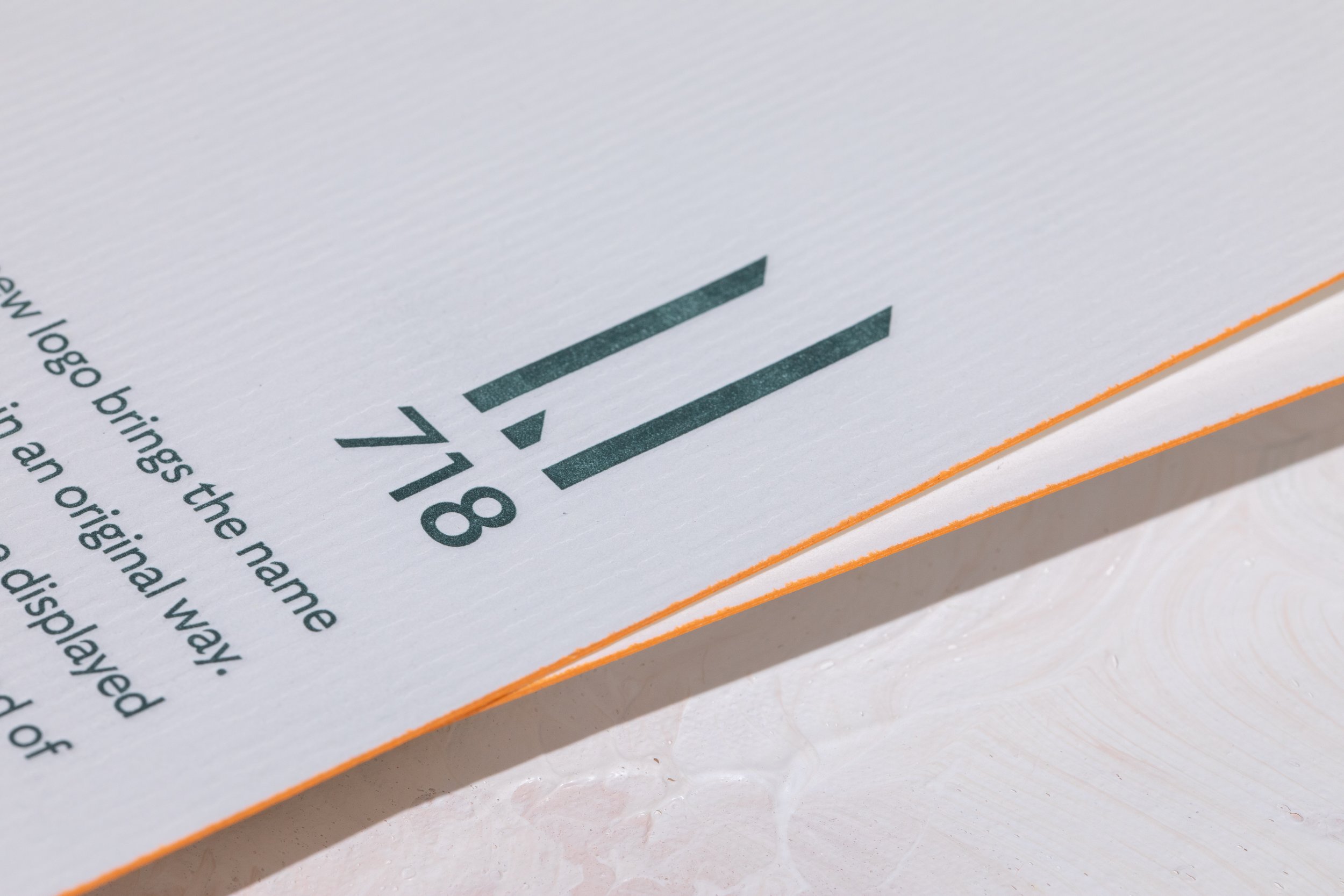 Brand Rollout Announcement on Textured Paper, Green Letterpress Printed and Orange Painted Edge