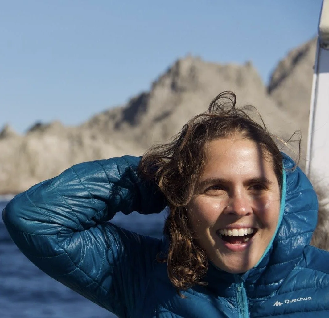 Arren Mendezona Allegretti, Family Adventure Squad nature guide, laughing in the wind on a mountain outing