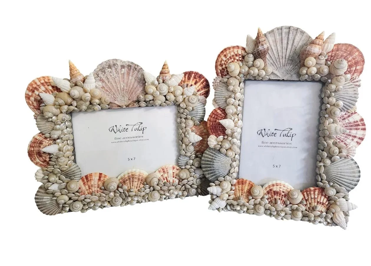 sea shell encrusted picture frame by white tulip boutique
