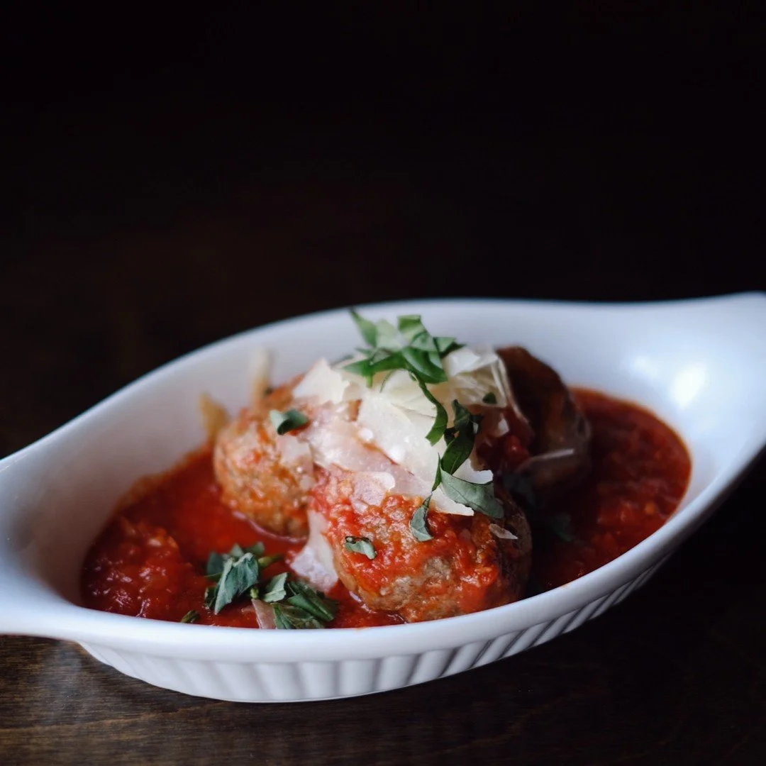 The Baked Sicilian Polpette is perfect for sharing or as a hearty side. 🍽️⁠
⁠
Our house-made meatballs are smothered in Rustica tomato sauce, served with freshly baked focaccia, and finished with Parmesan and fresh basil &mdash; a true taste of Ital