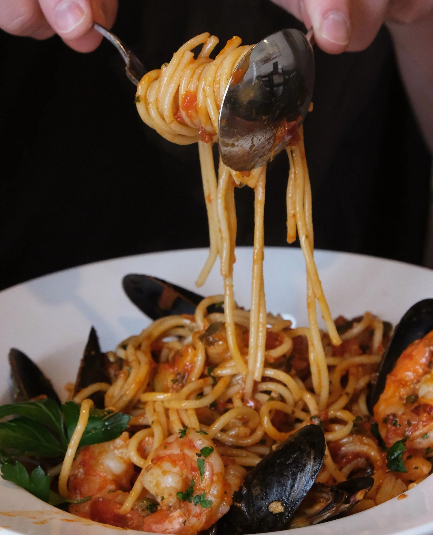Puttanesca di Mare 🌊🍝⁠
⁠
Spaghetti tossed in a light rustica sauce with mussels, tiger shrimp, bay scallops, zucchini, and capers.⁠
⁠
Bright, briny, and beautifully balanced. ⁠
⁠
#tesororestaurant #collingwoodrestaurant