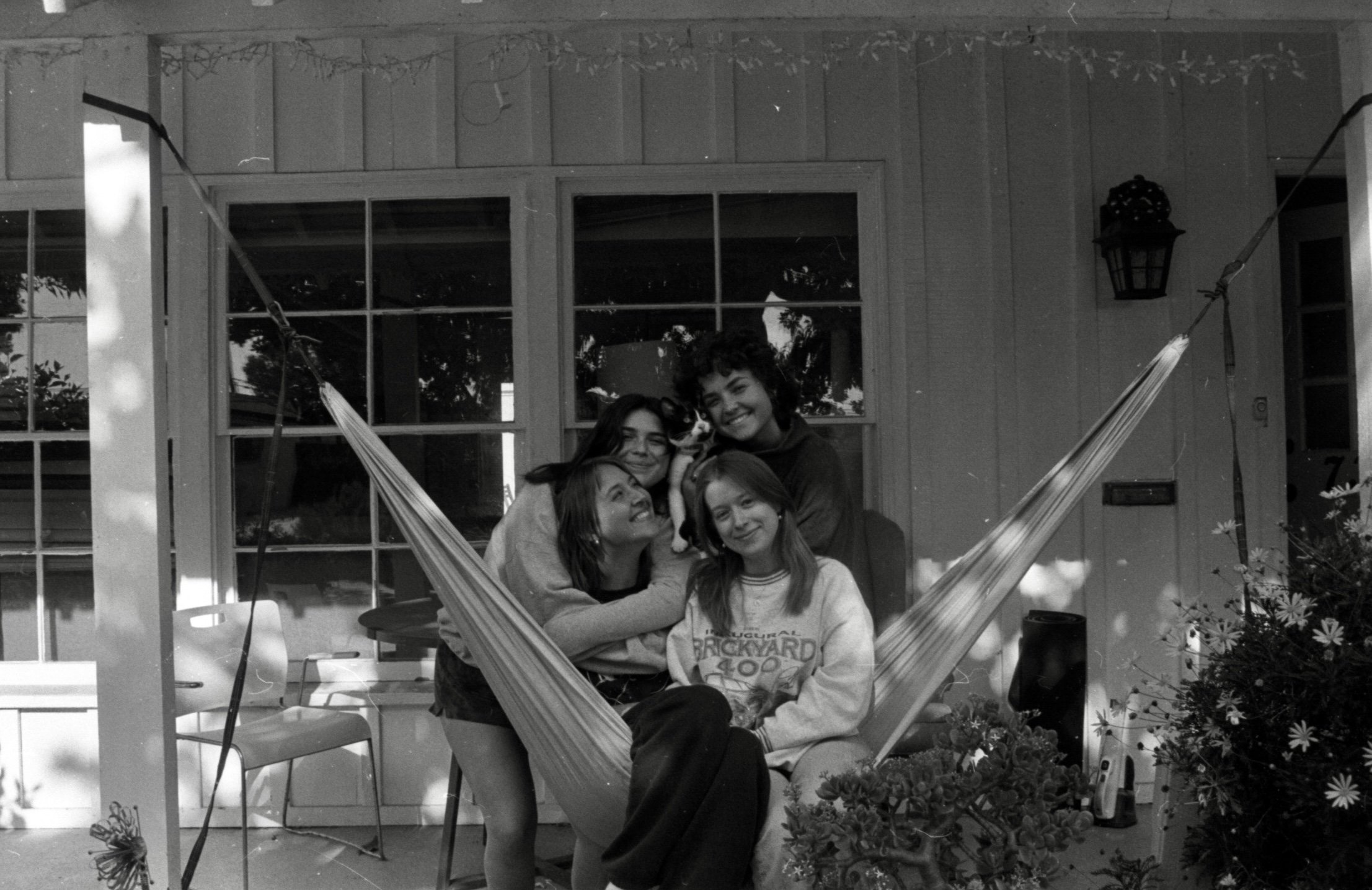 'Spencer, Meryl, Kennedy, Lauren, and Kitty" 35 mm Ilford HP5 Plus ISO 400