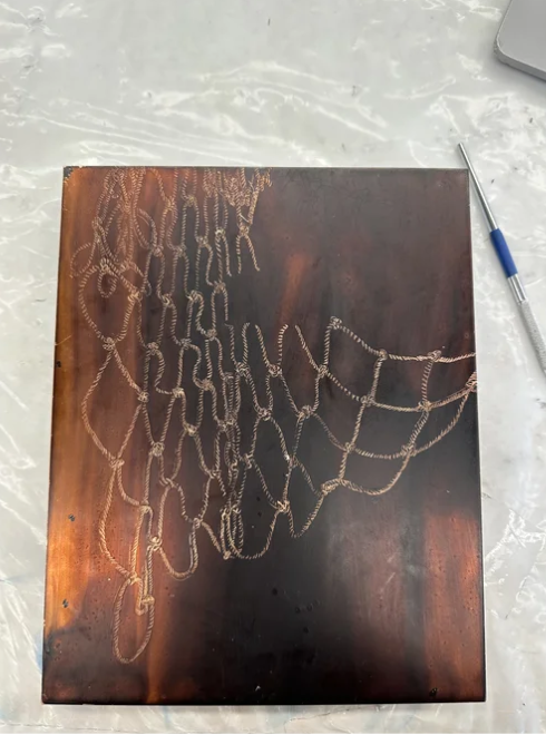 "Nets Series: At Rest" Drawing by Paloma
Barhaugh-Bordas, Assisted etching and printing by Ella Cote, 2024 on copper plate