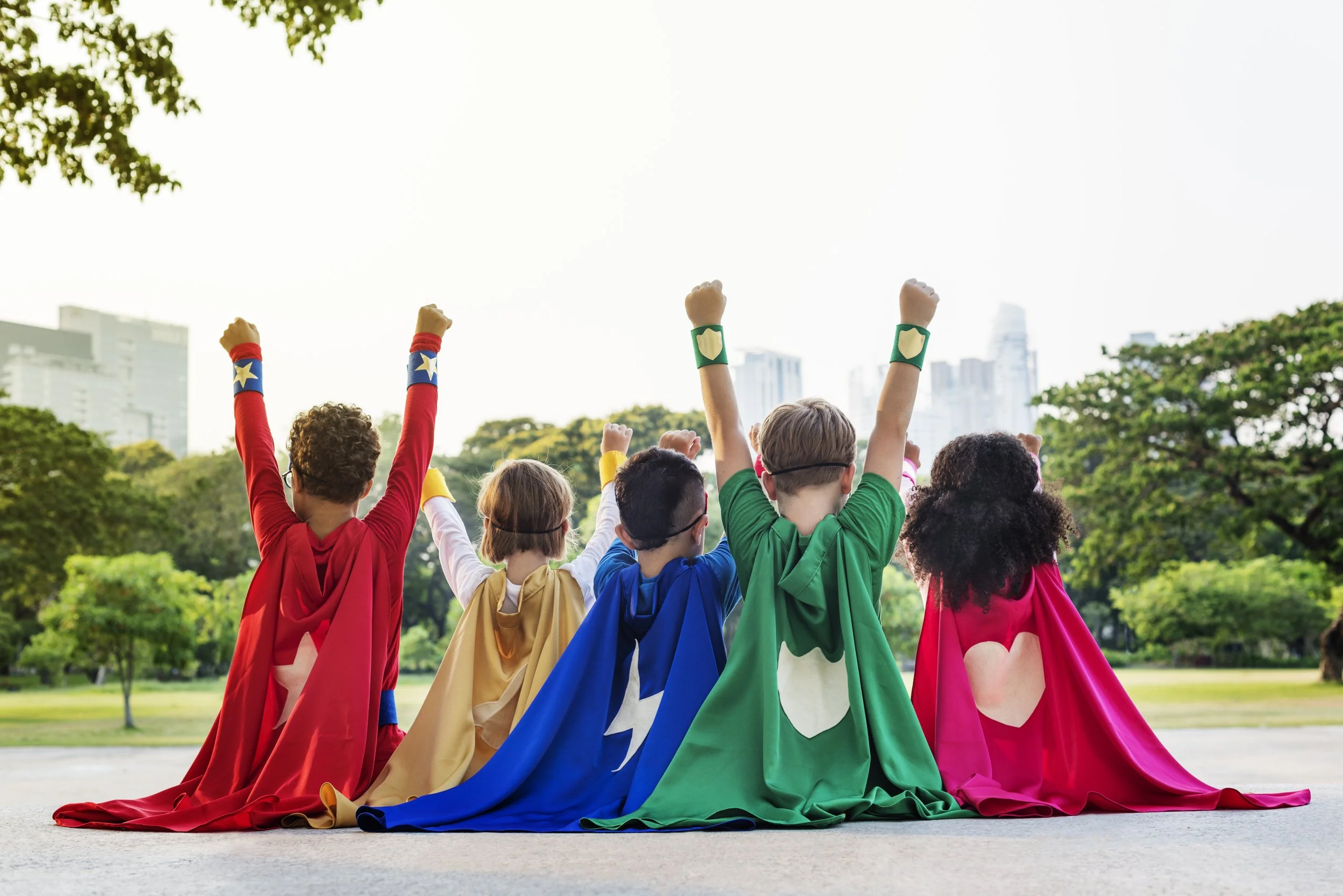 Group of Children with superhero capes and outfits