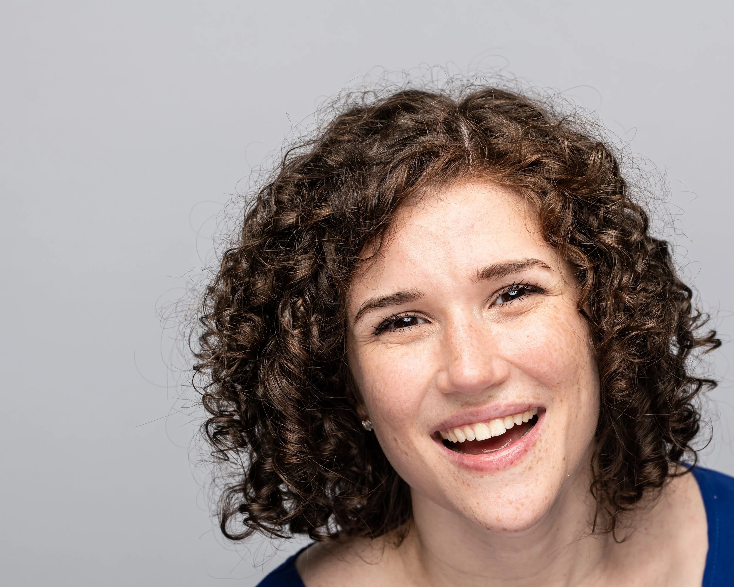 Caroline%20Headshots%206%2012%202022%20Final-56.jpg