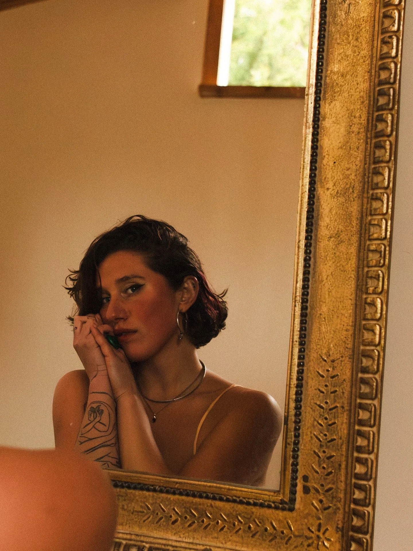 Taken after chopping all my hair off 
Upon a storm soaked cliff  Salty winds &amp; rain baptizing my bare neck 
My tears mixed with rains grace 

I remember the day so clearly 
How I woke 
Ready to let a part of me die 
Only a couple days in my new h