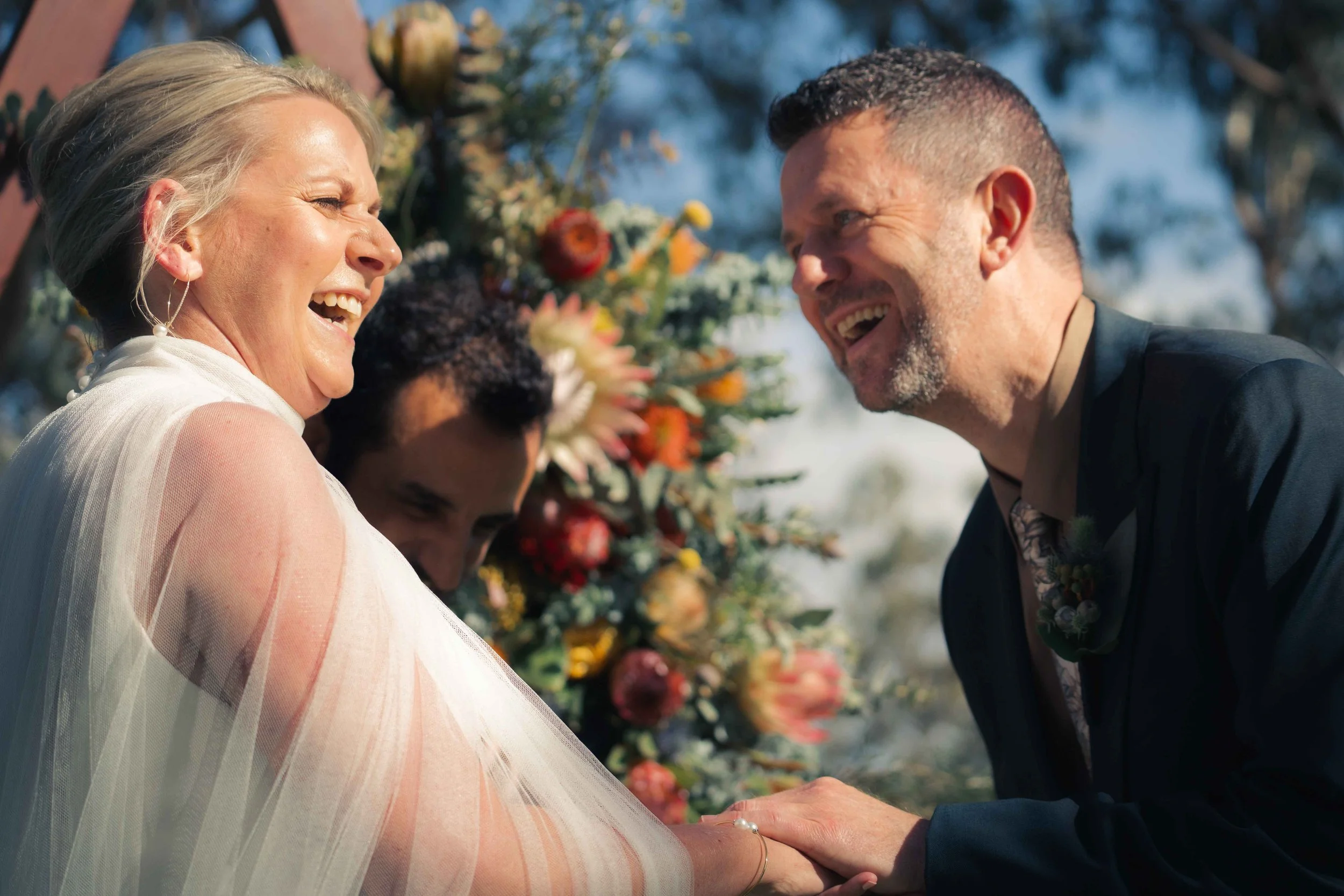 bride and groom laughing bouquet mature couple