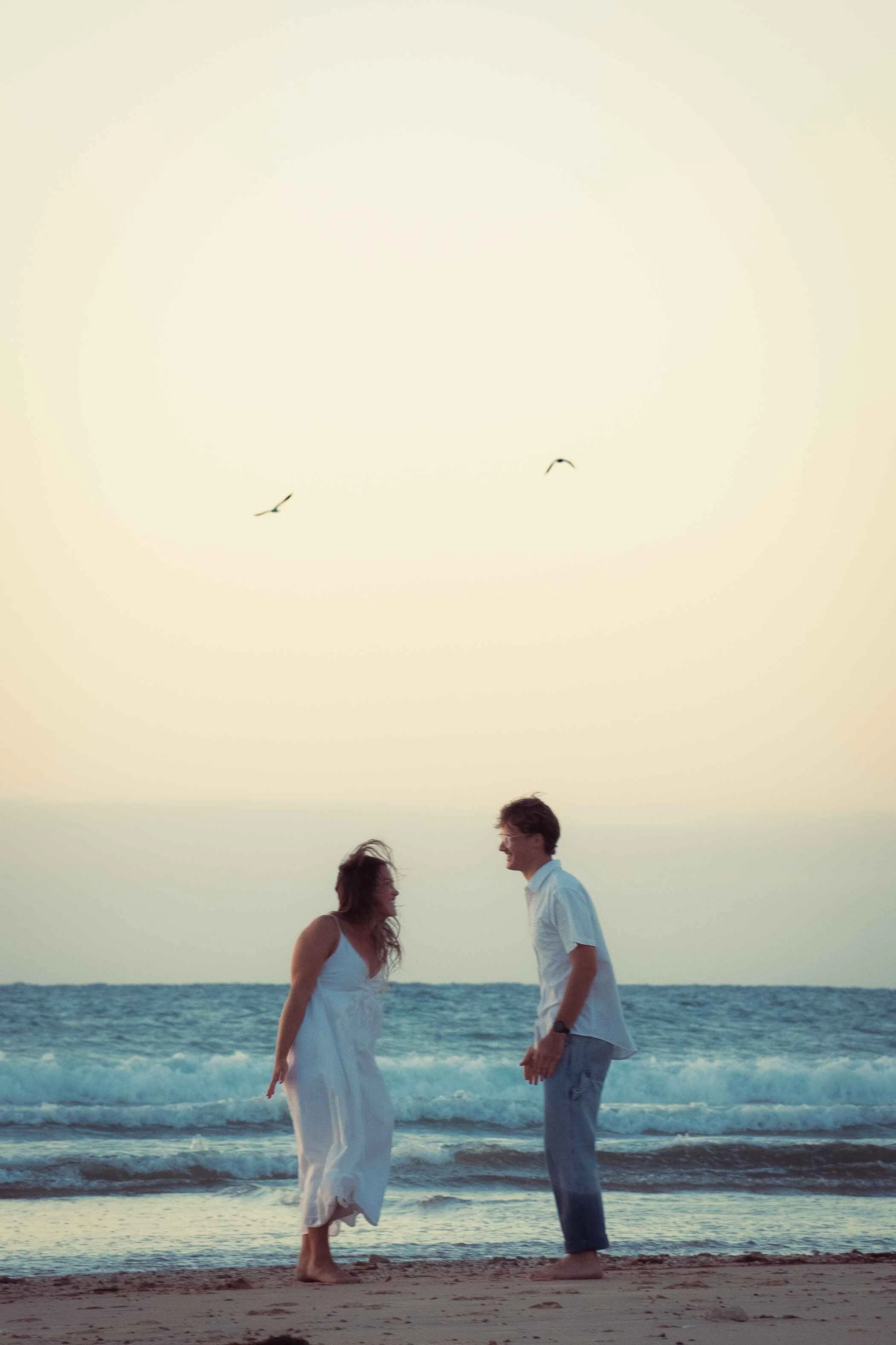 candid cute engagement photos beach Noarlunga