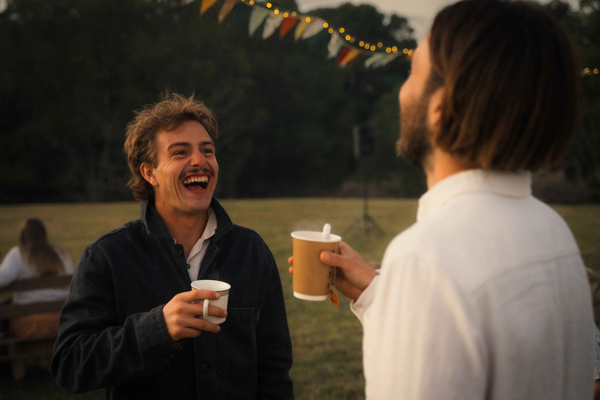wedding crowd candid laughing vintage Nimbin