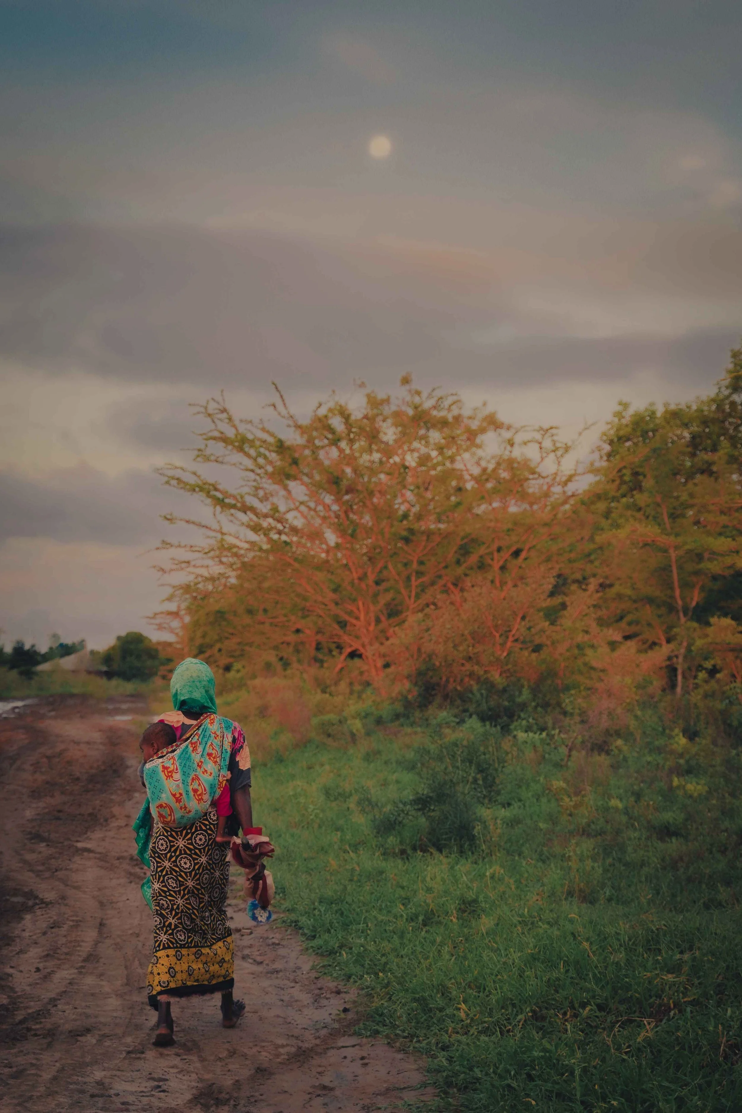 widow with child and moon Kenya