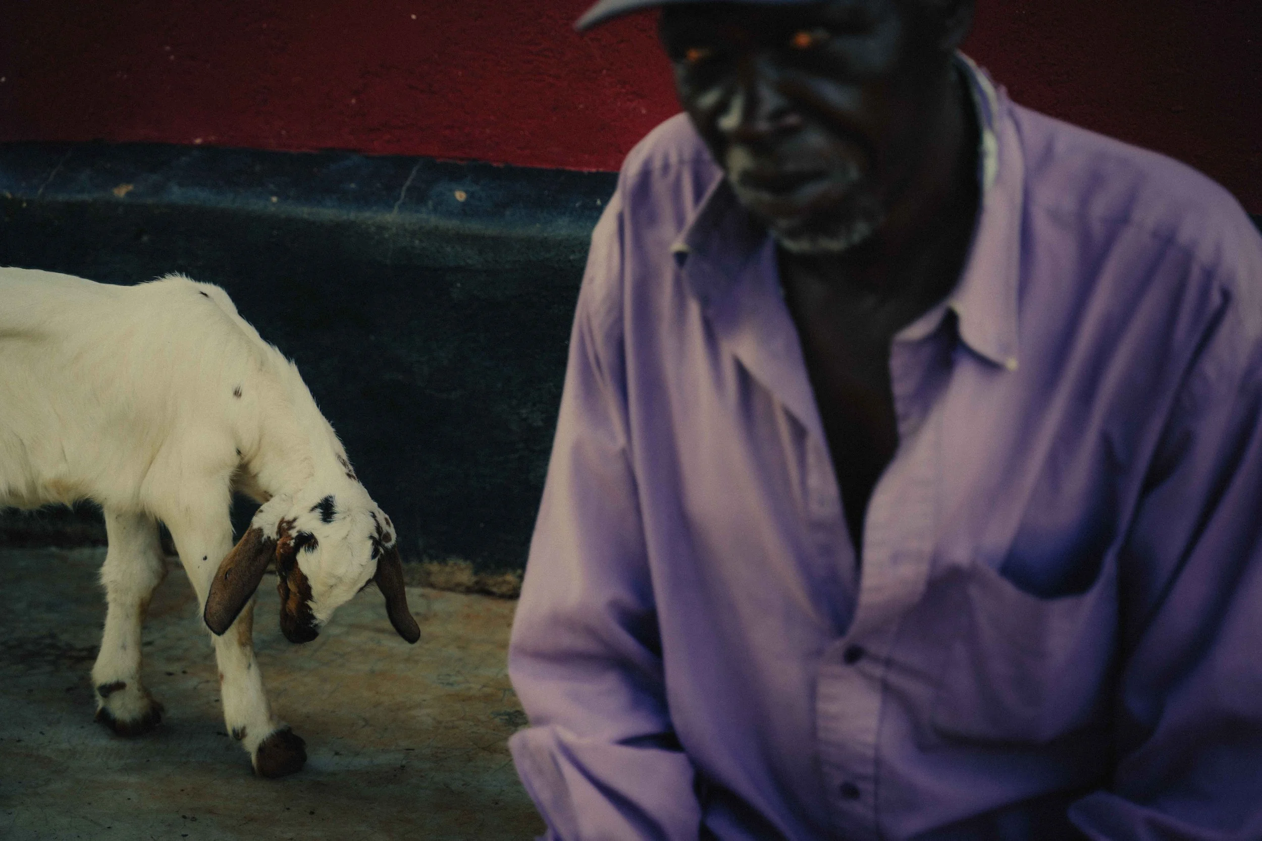 man with goat Kenya