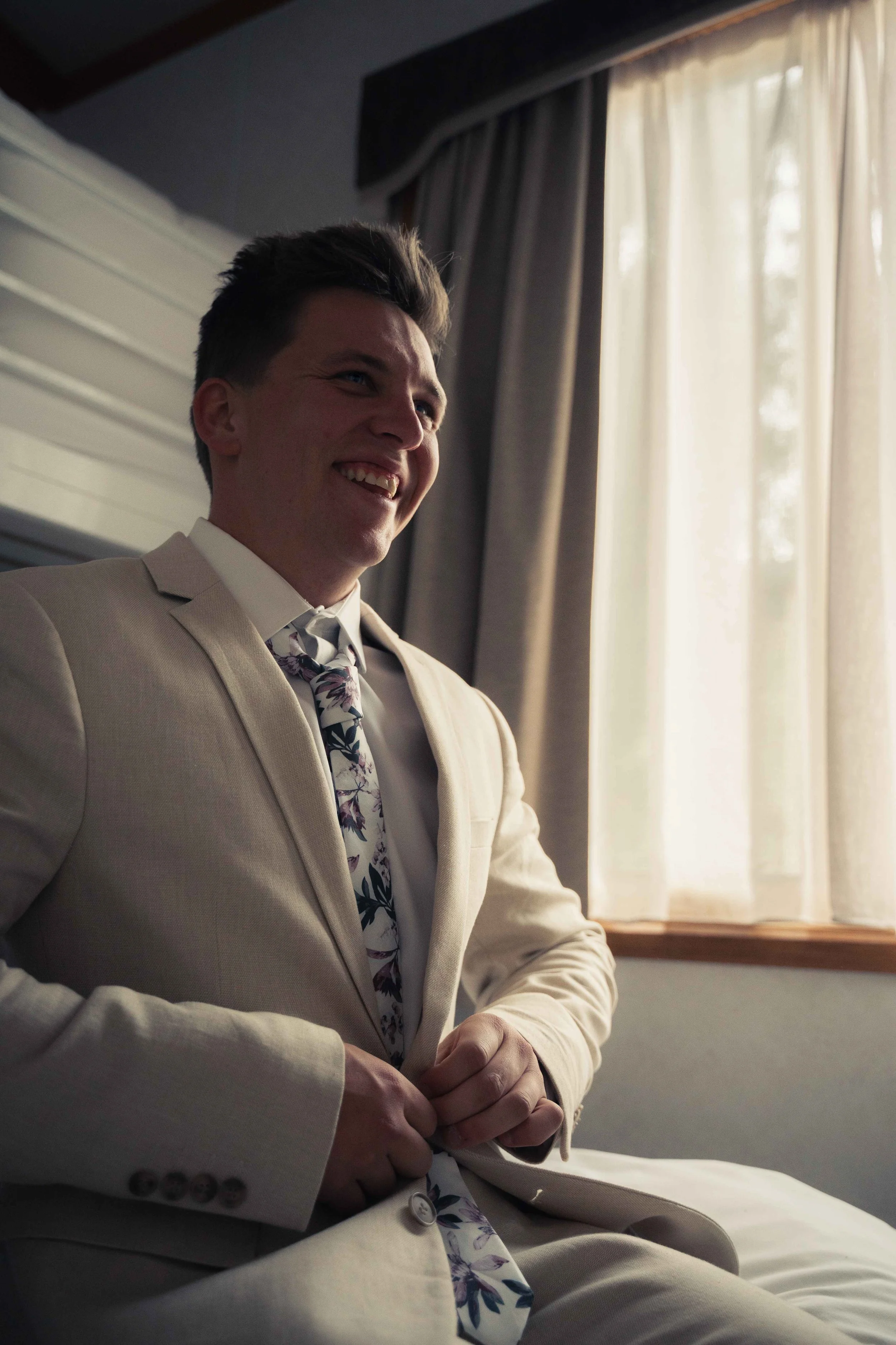 Groom and groomsmen preparation beige suits