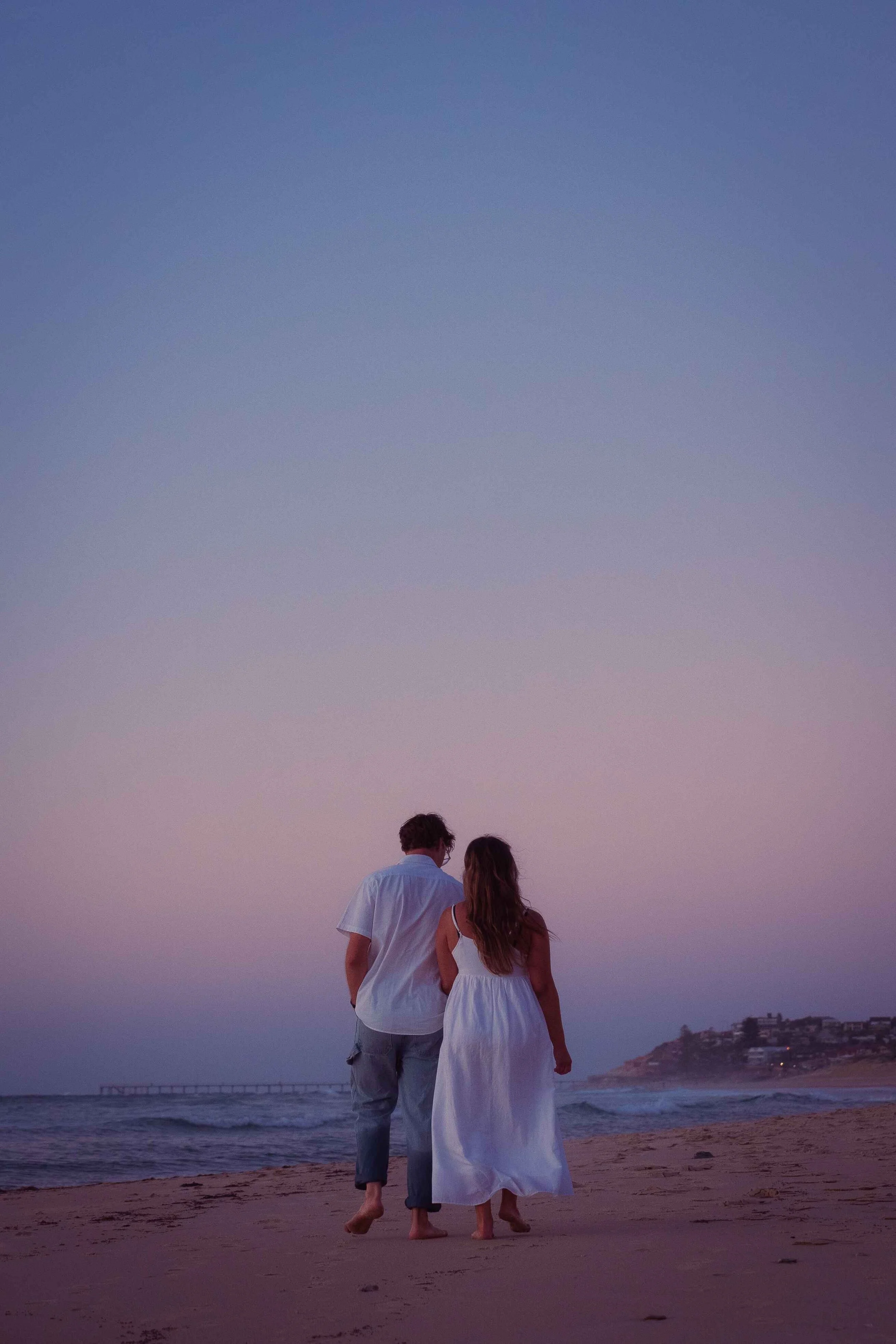 artistic engagement photos soft sunset beach Noarlunga