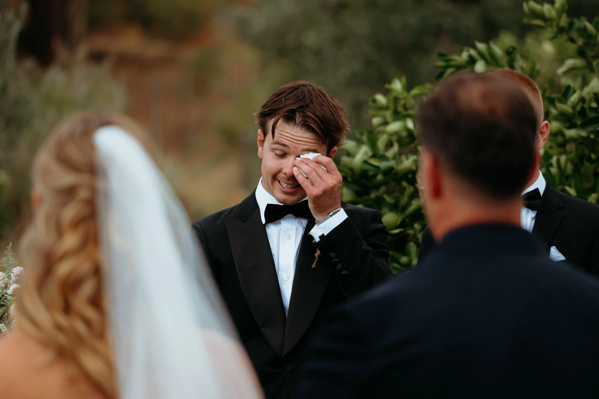 Adelaide hills wedding photographer groom crying wiping tears artistic